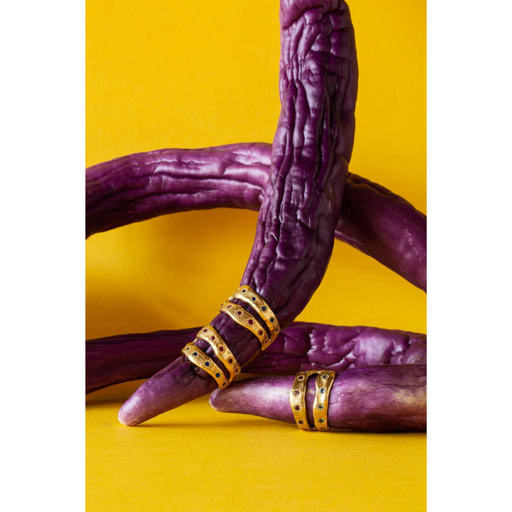 Ring Side by Side by Oraik yellow gold blue sapphire and ruby