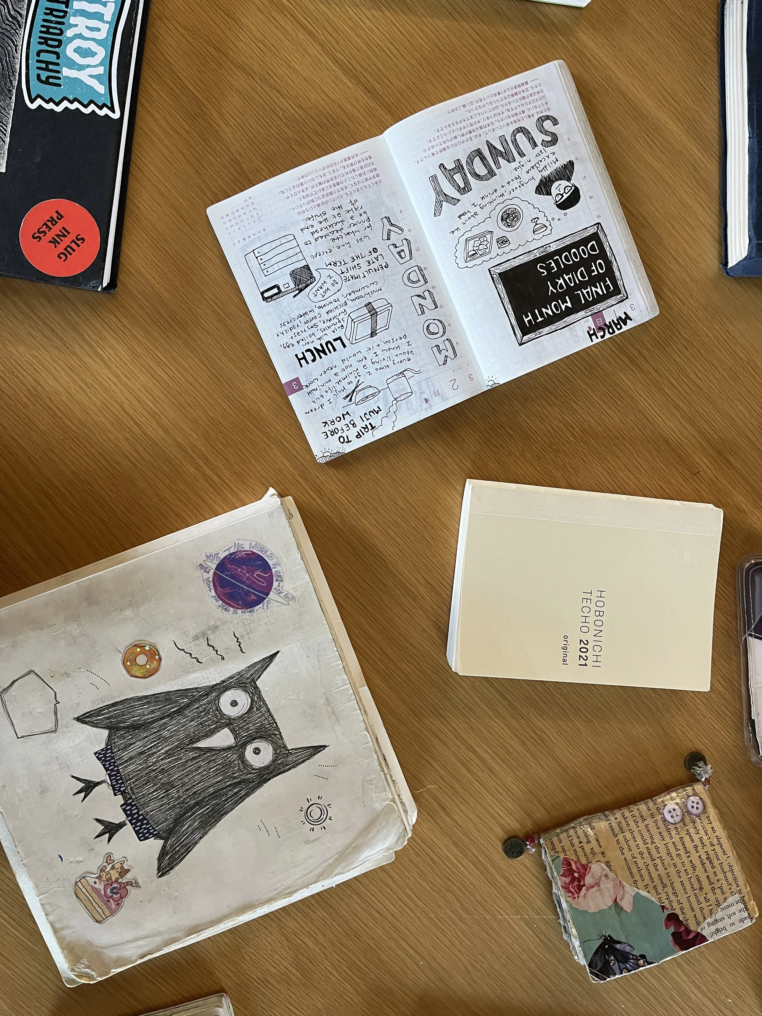 a selection of sketchbooks (spot the Hobonichi!)