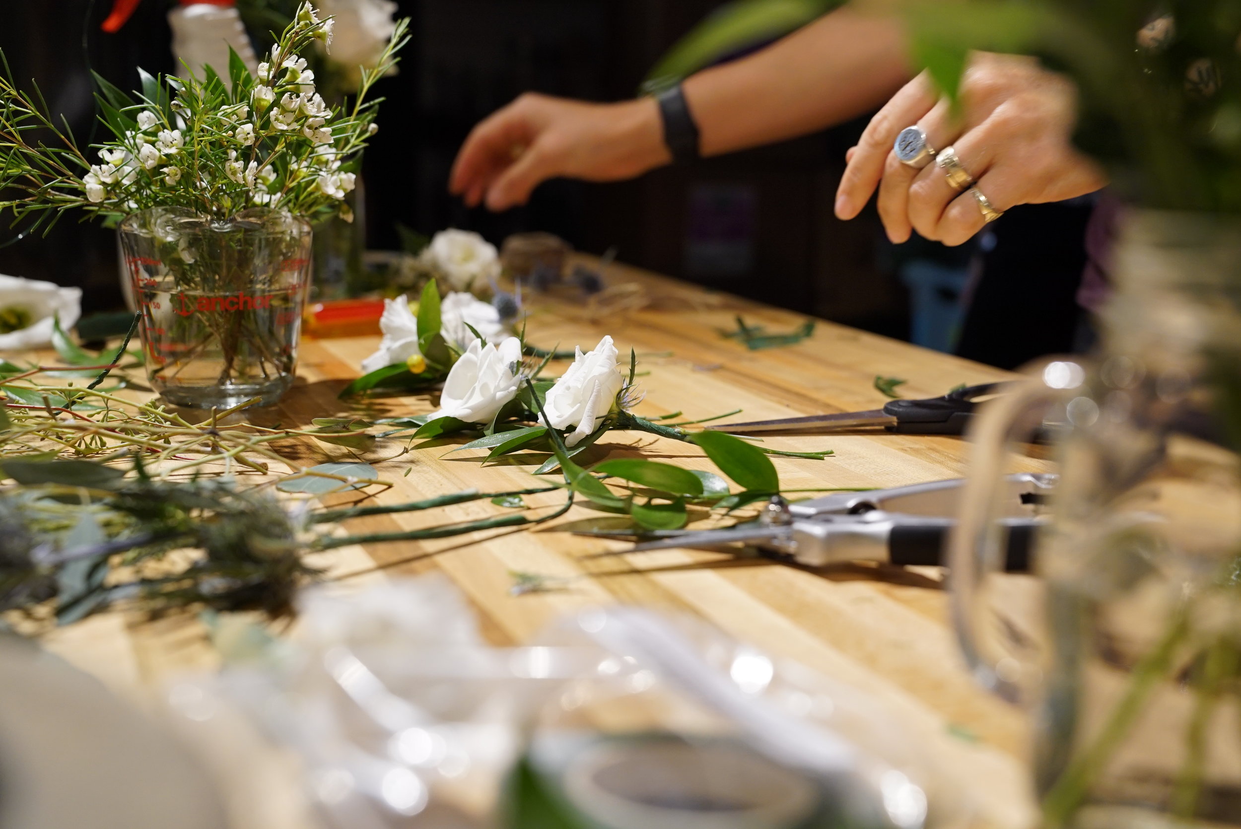  Boutonnieres are one of the last things to be assembled, as they will not have access to water once they're made. Lisianthus, while incredibly delicate looking, are actually a great choice for a long lasting boutonniere.&nbsp; 
