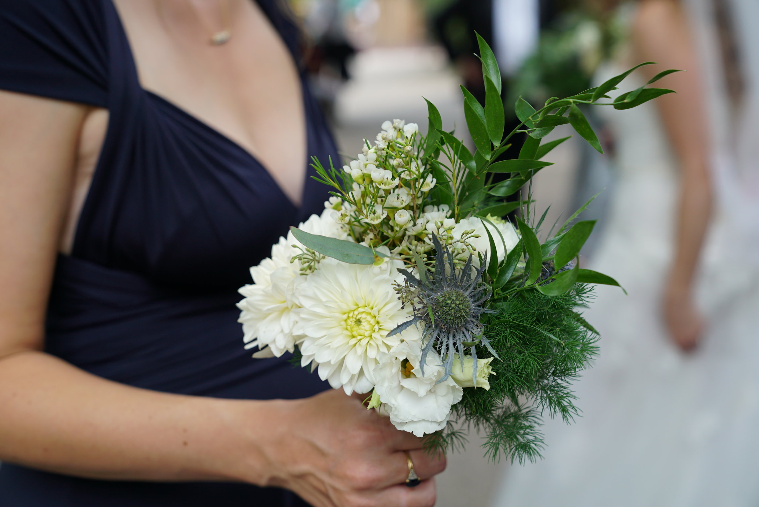  Bridesmaids bouquets were smaller versions of the brides.&nbsp; 