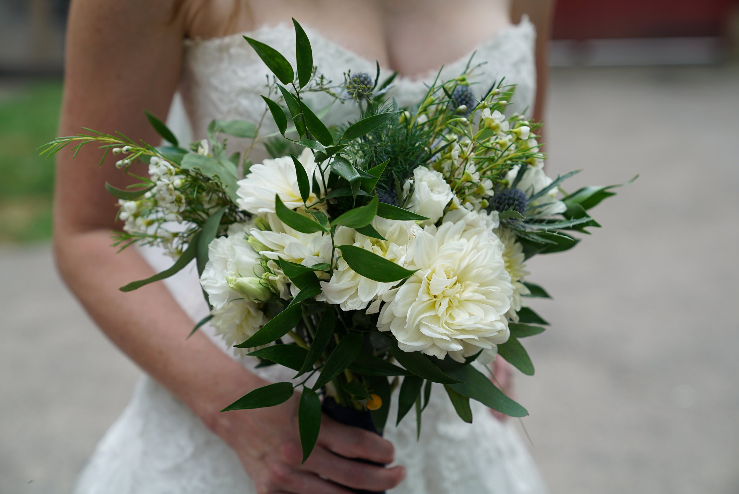  It's always hard to stop adding flowers into a bouquet, but with the bride being petite I wanted a nicely proportioned grouping. Again, Italian Ruscus shines as the dark green,&nbsp;with some Seeded Eucalyptus to lighten it up. I wish there were mor