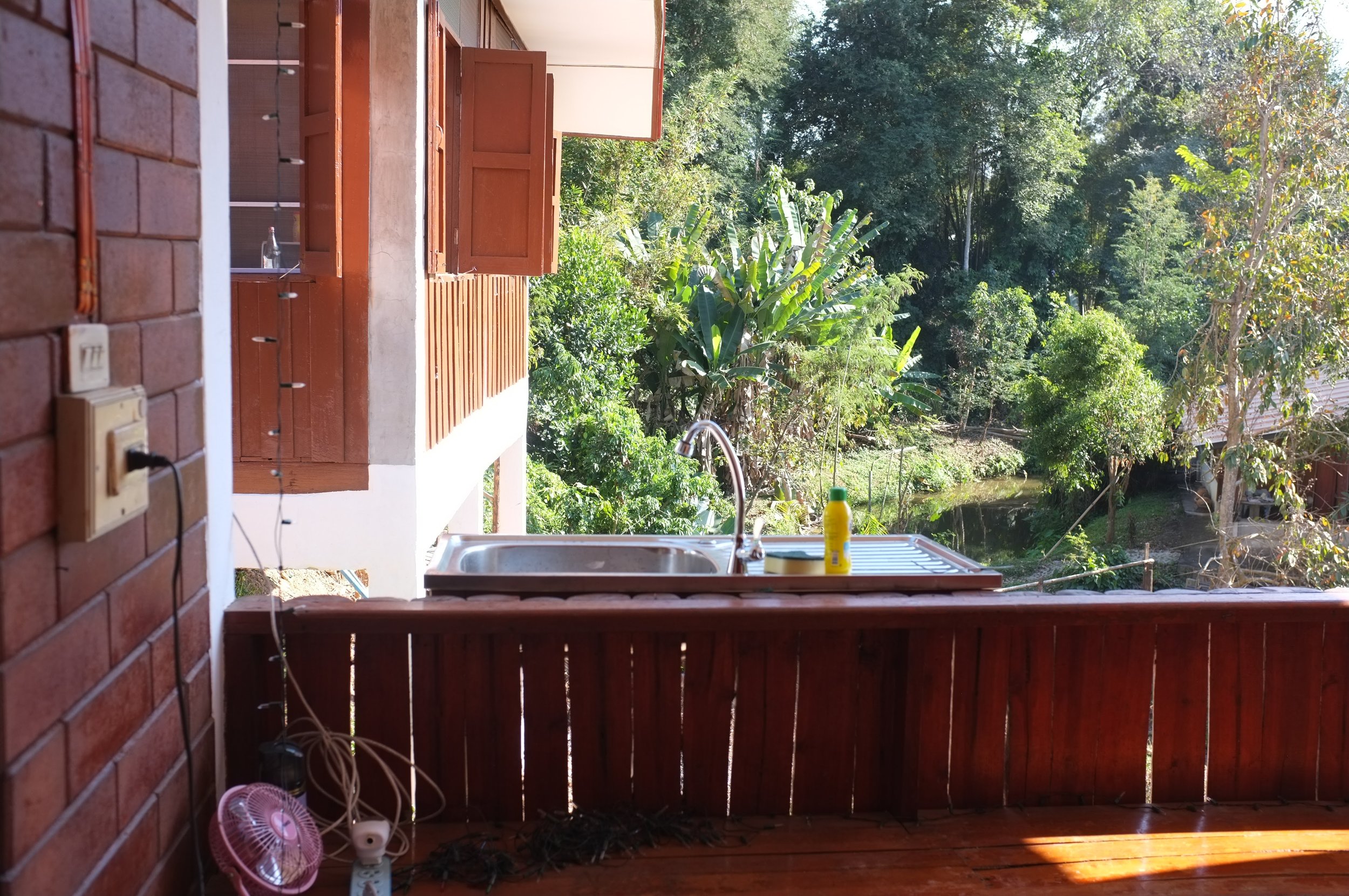 With 3 weeks left in our home we FINALLY got a kitchen sink...and a new neighbor. Yes, that house next to us was built in one month. Yes, they woke us up with construction every morning. 