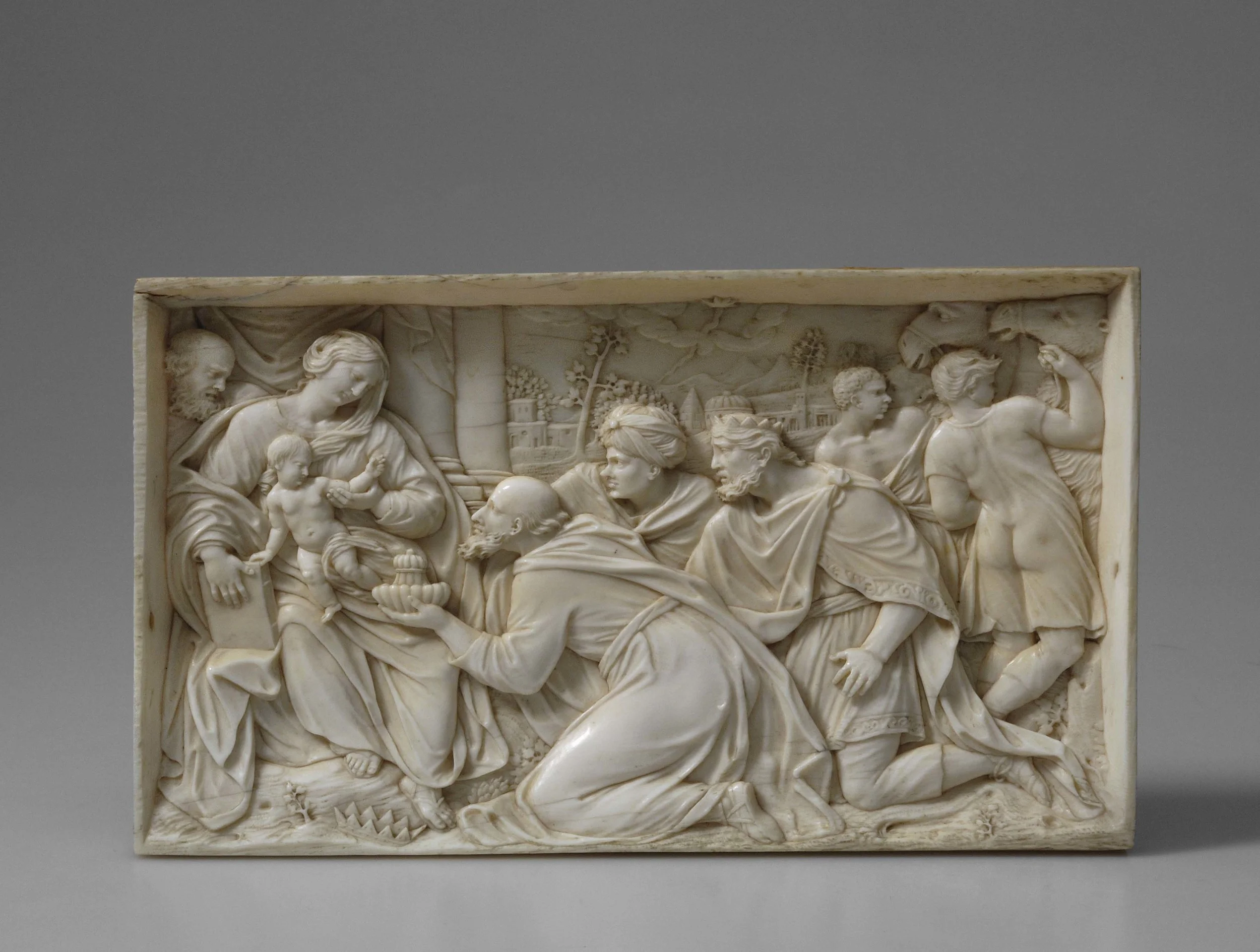   ADORATION OF THE MAGI   Attributed to the Workshop of Dominicus Stainhart (1655-1712)  German   circa 1700   Ivory  17.3 x 10 cm 