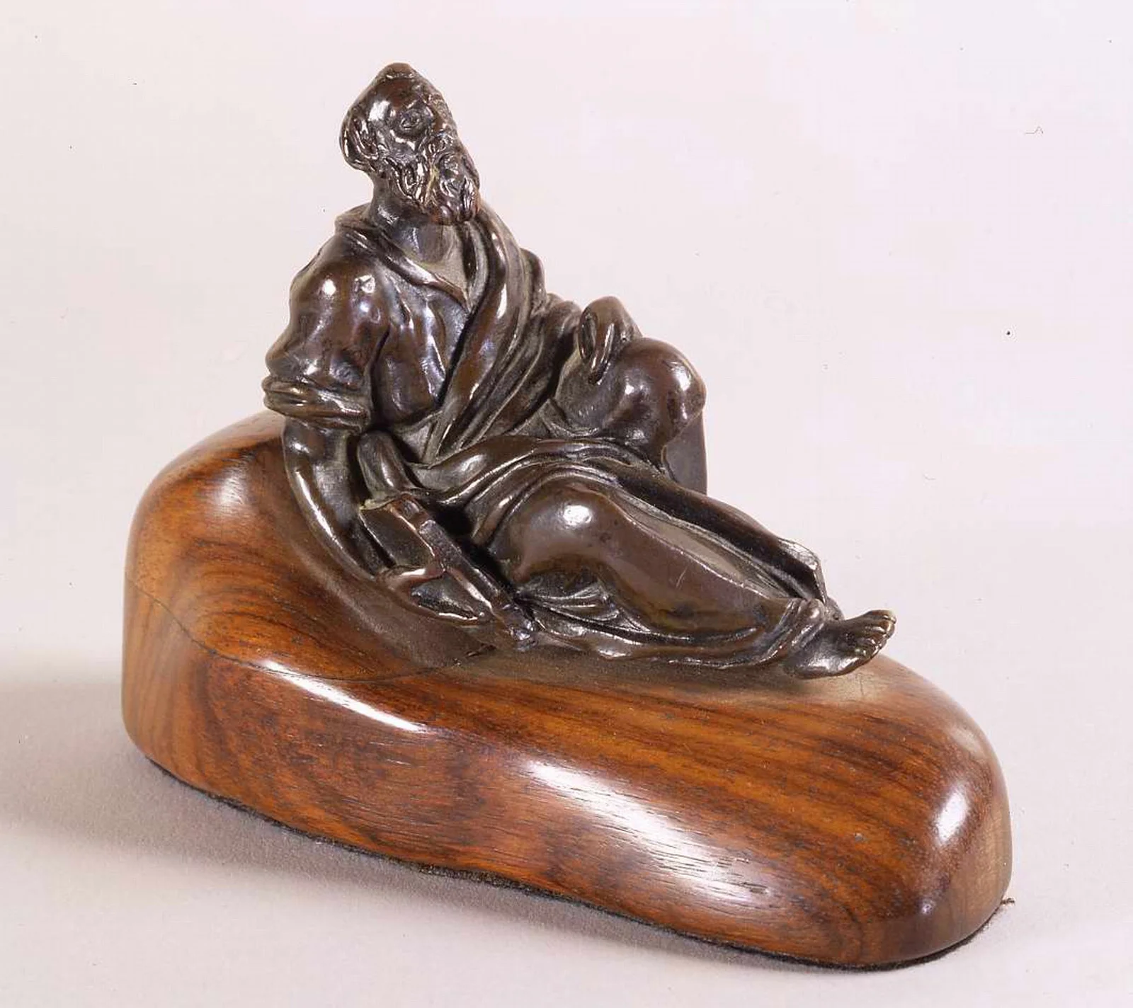 RECLINING FIGURE OF A PROPHET Circle of Girolamo Campagna, Verona 1549-50; Venice after 1626 Venice Late 16th century Bronze Length: 7.62 cm