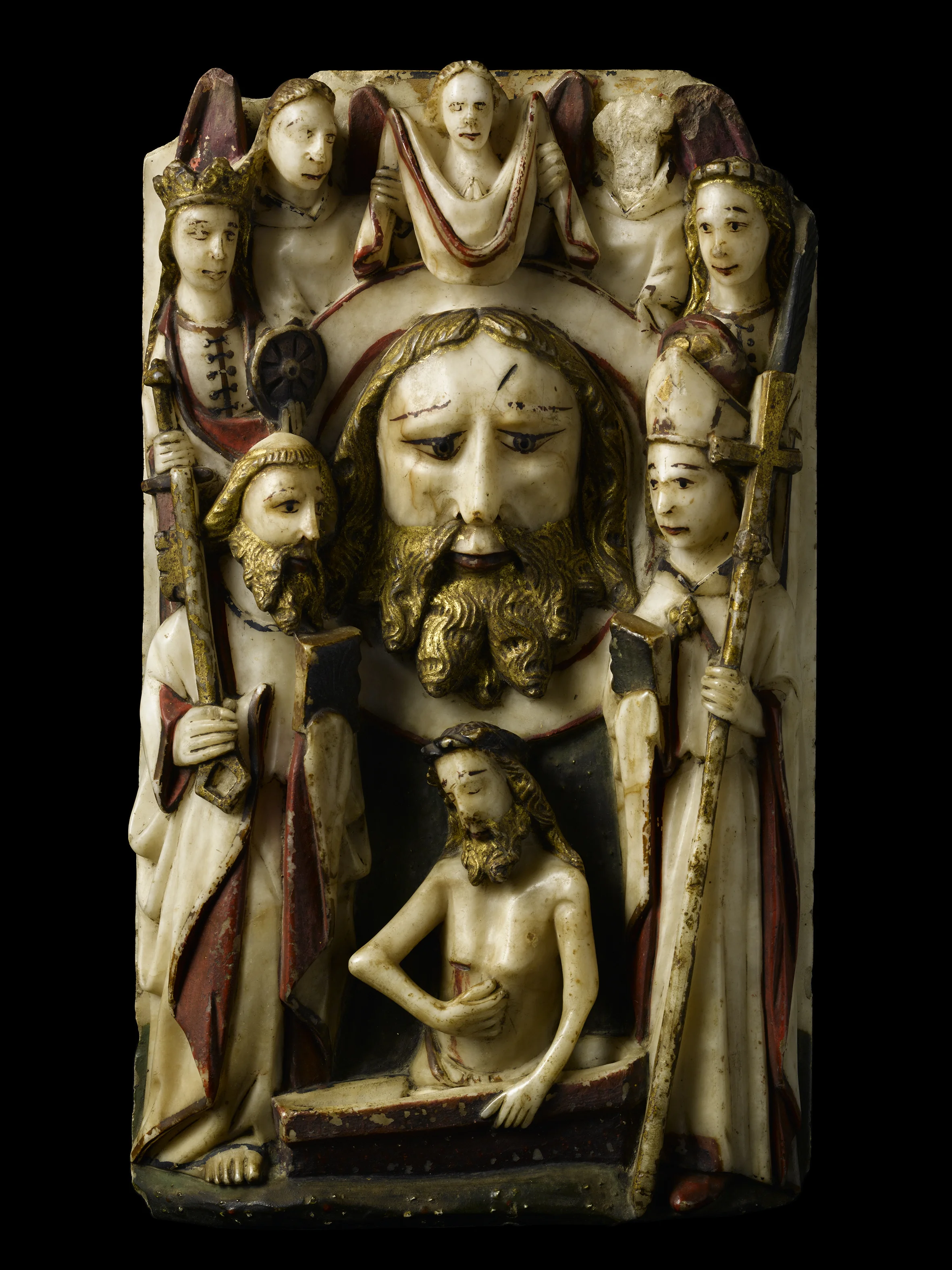 THE HEAD OF ST. JOHN THE BAPTIST England (Nottingham) Late 15th century Alabaster high relief with the original partial polychromy 11.6 x 7.1 inches