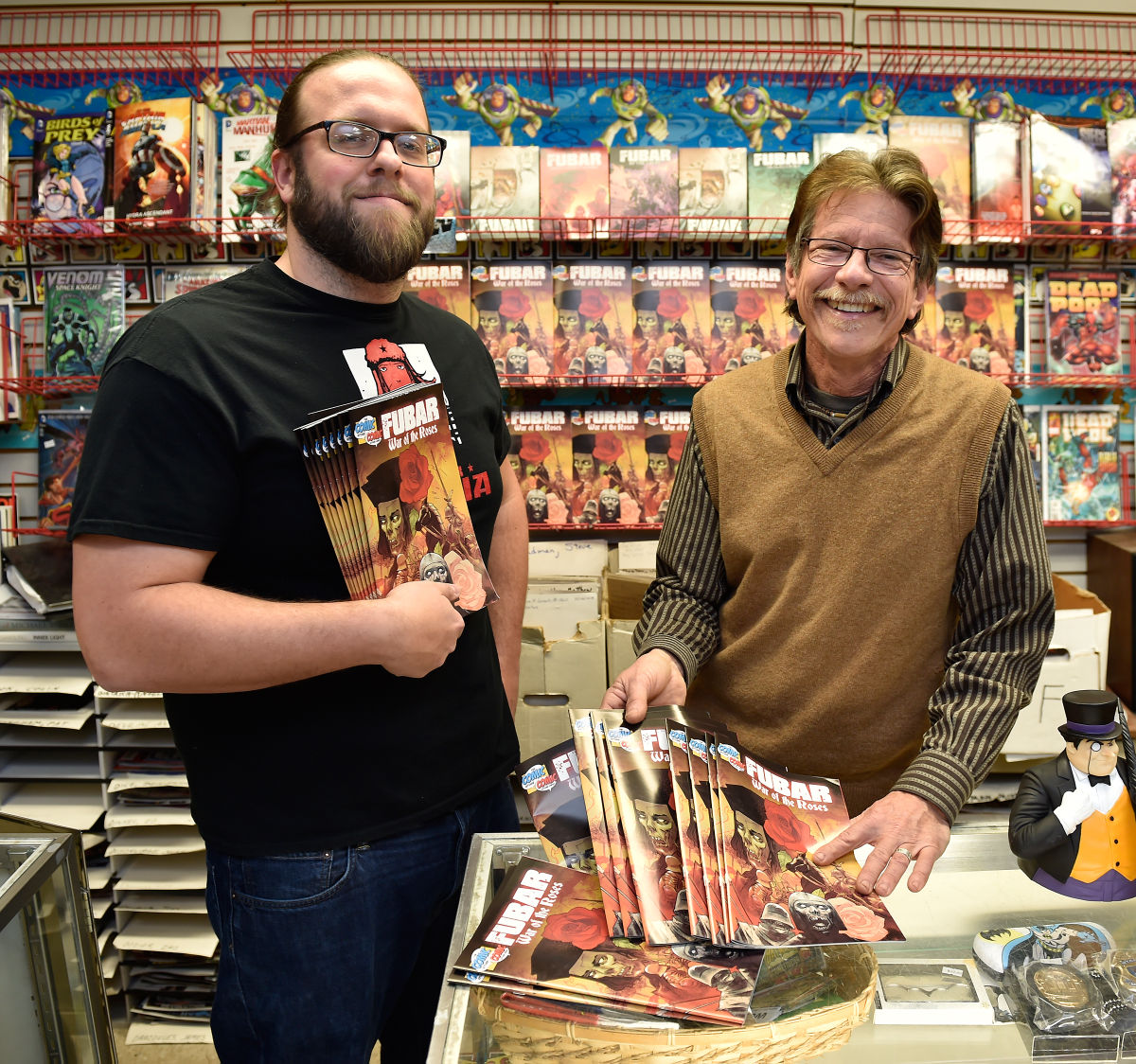 Artist / Writer Jeff McComsey (left), The Comic Store owner Joe Miller (right)