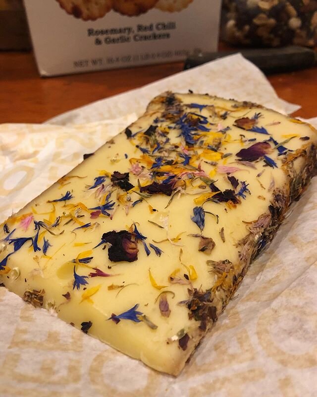 This is by far the most beautiful piece of cheese I have ever bought. It tastes as good as it looks!  #wildflowers #cheddar #cheese #brooklyn