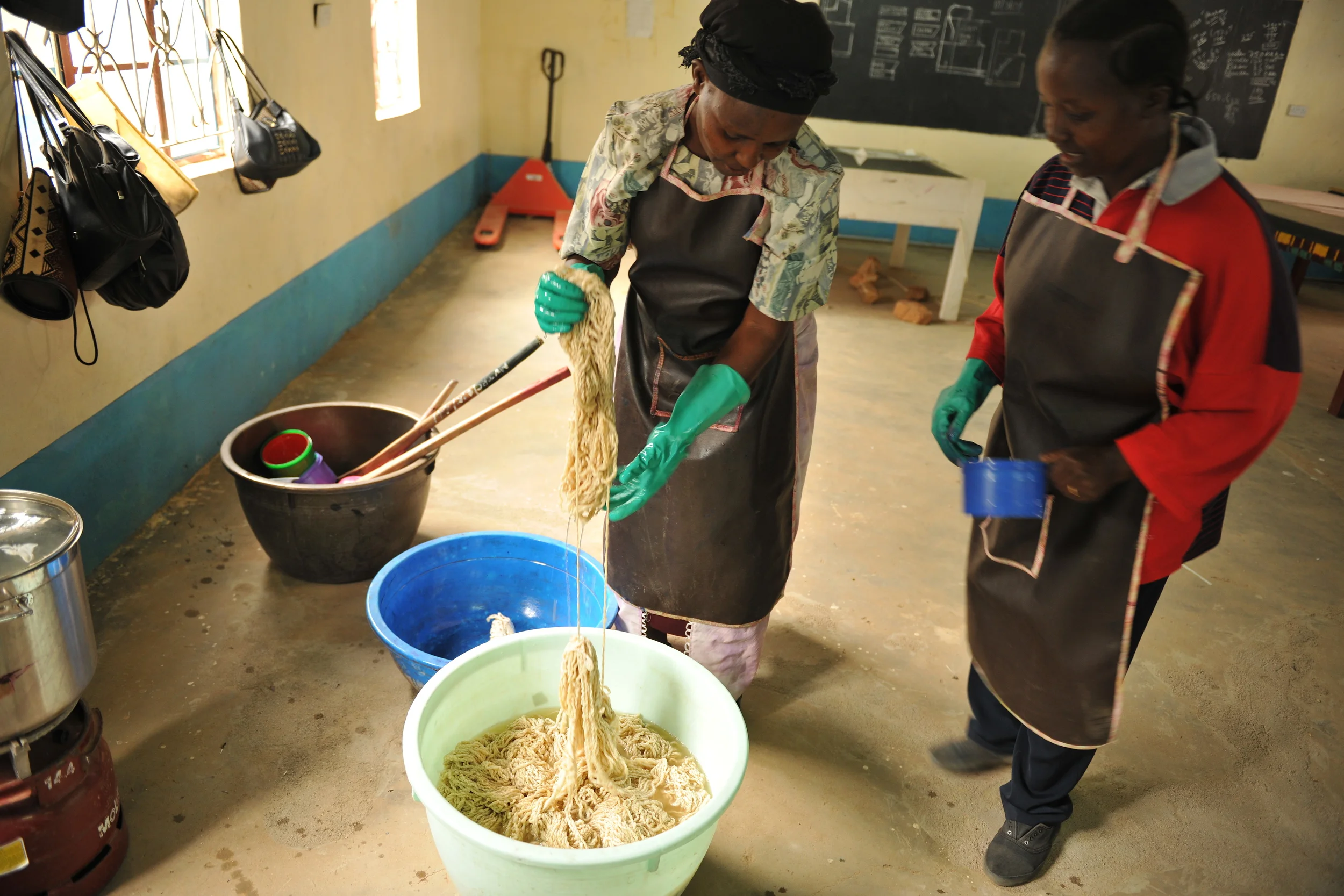 ladies washing yarn