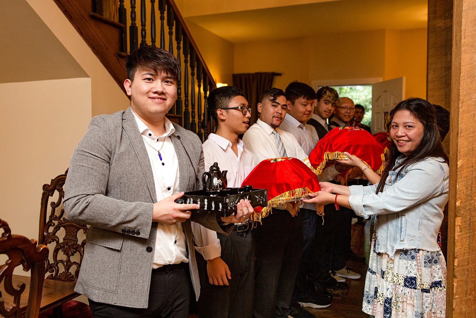 Group portrait of women in a living room at an estate during a wedding weekend gathering