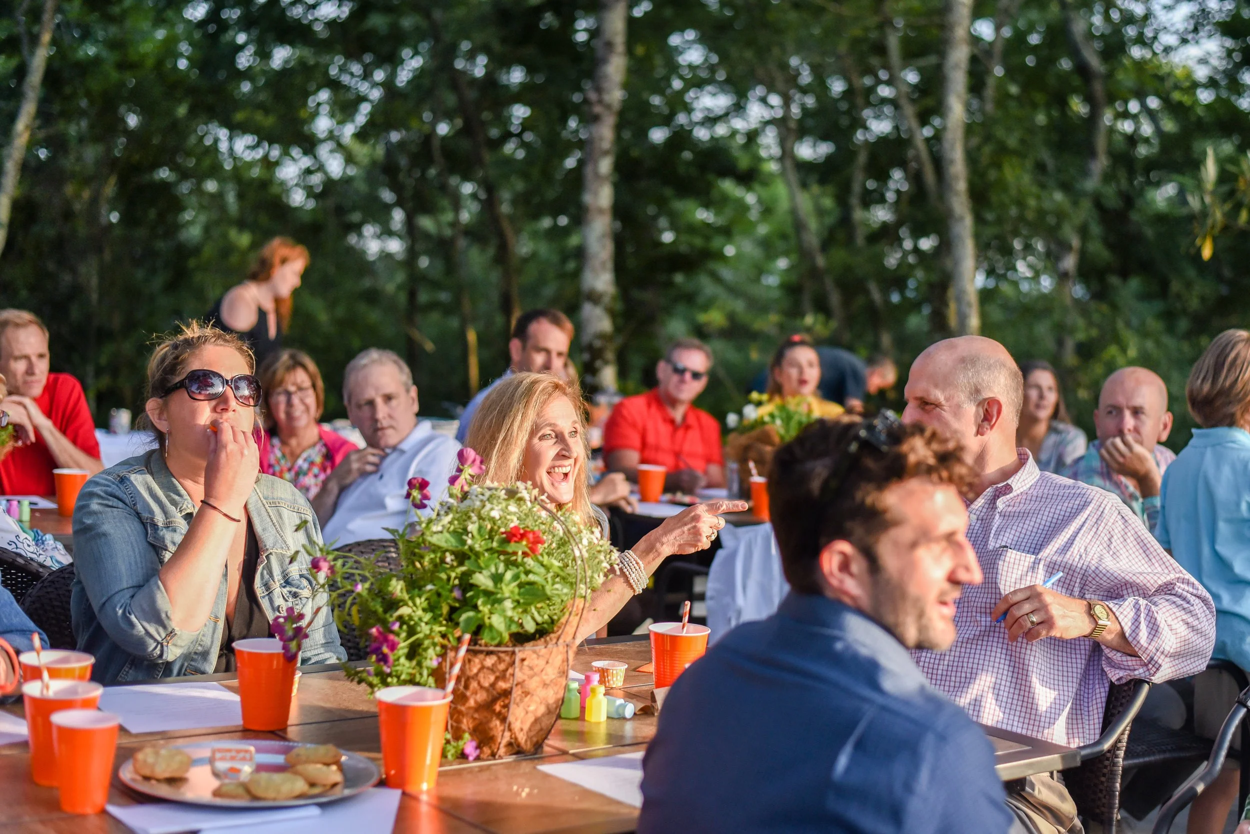 outdoor-wedding-weekend-guests-dining-at-wooded-lawn-party.jpg