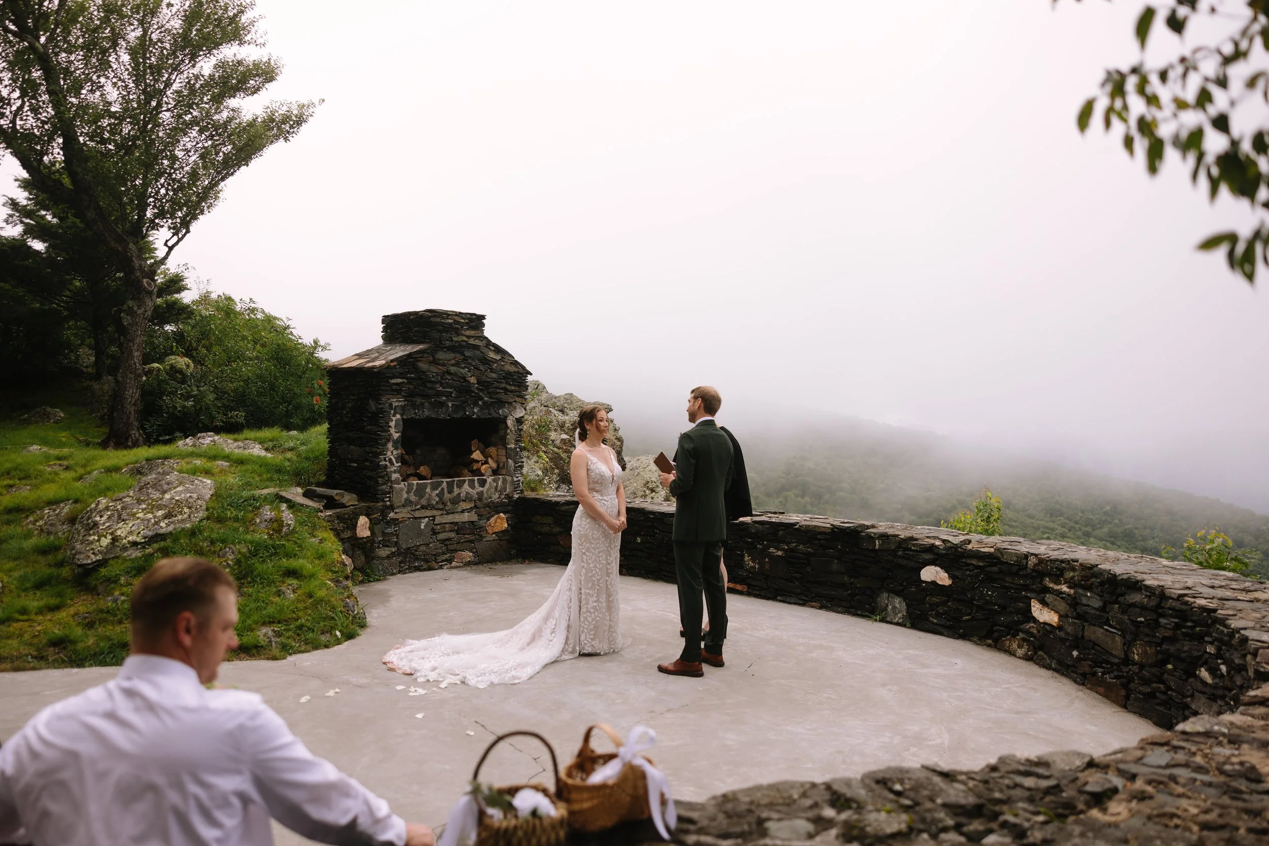 foggy-mountain-overlook-wedding-ceremony-stone-terrace.jpg