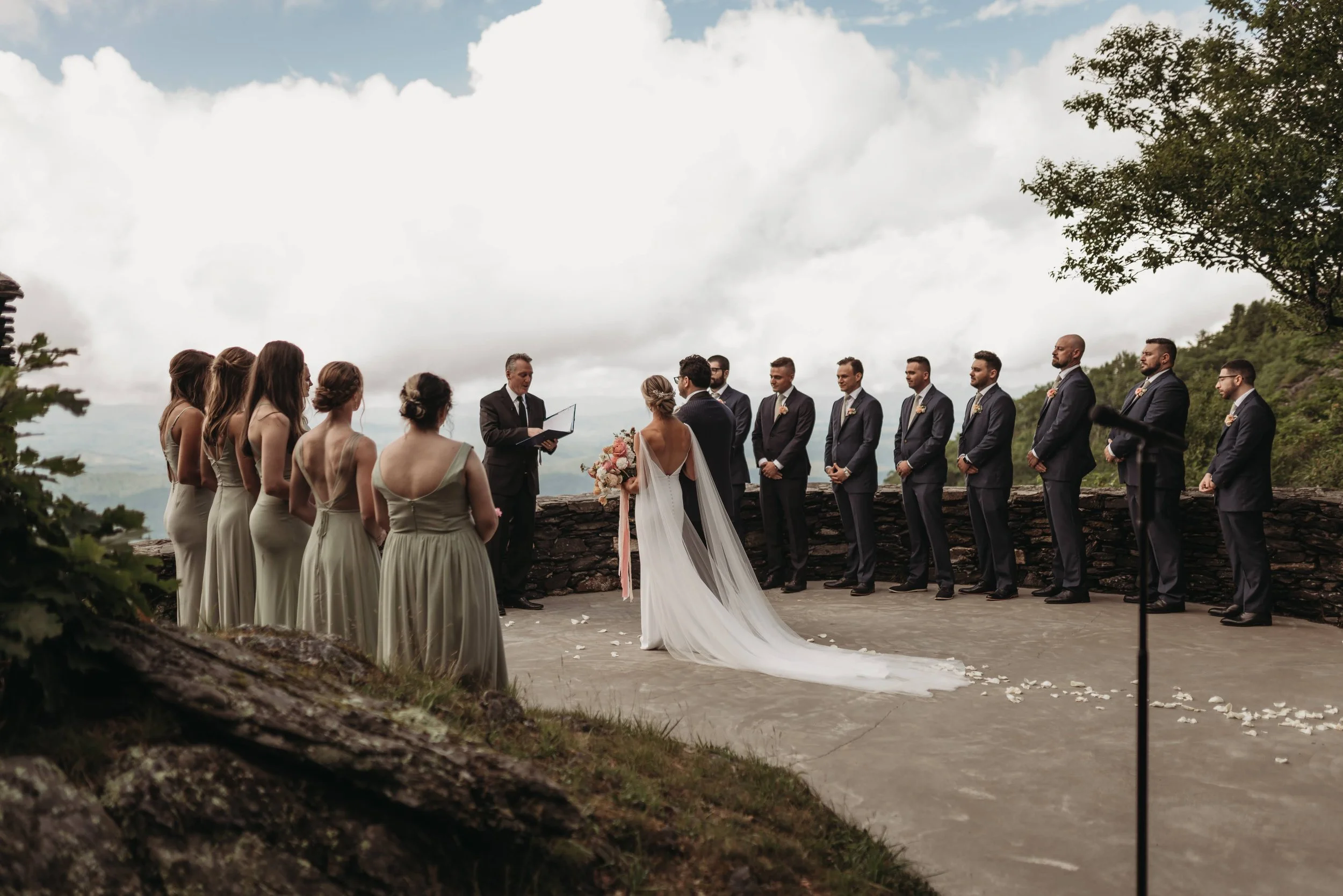 mountain-overlook-wedding-ceremony-with-sage-bridesmaids.jpg