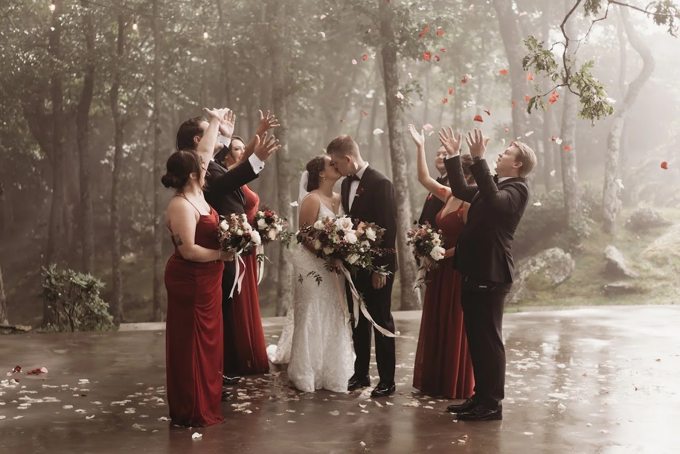 Close-up of groomsmen hands showing watches and tuxedo cuffs in a getting-ready detail shot