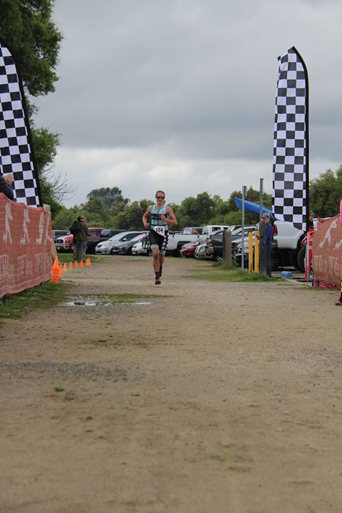 Running in to the finish for the age group win and 3rd female overall. Thanks Craig Dvta for the pic!
