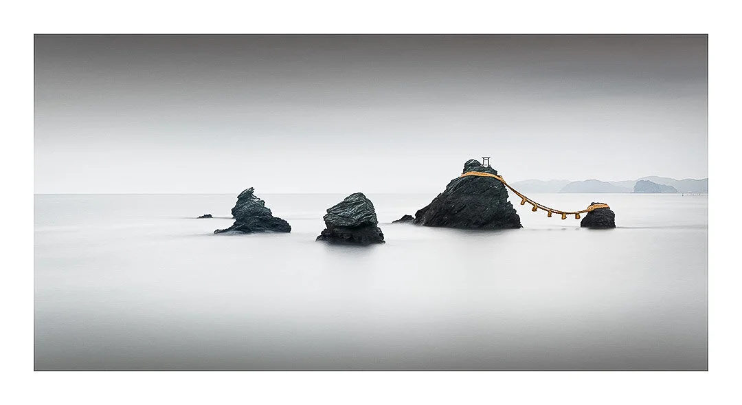 Kizuna | Japan, 2019 
The bonds or connections between people...These are two sacred rocks connected together by a shimenawa rope, creating a duality of the spiritual and earthly realms. I'd like to think that the three smaller rocks depicted are the