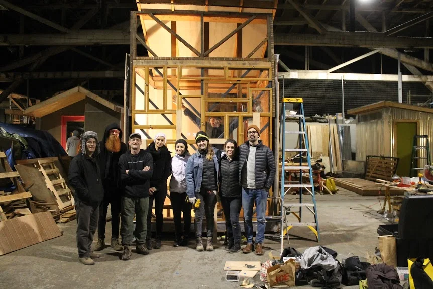 CPID Cocoon Pod Team in Warehouse.JPG