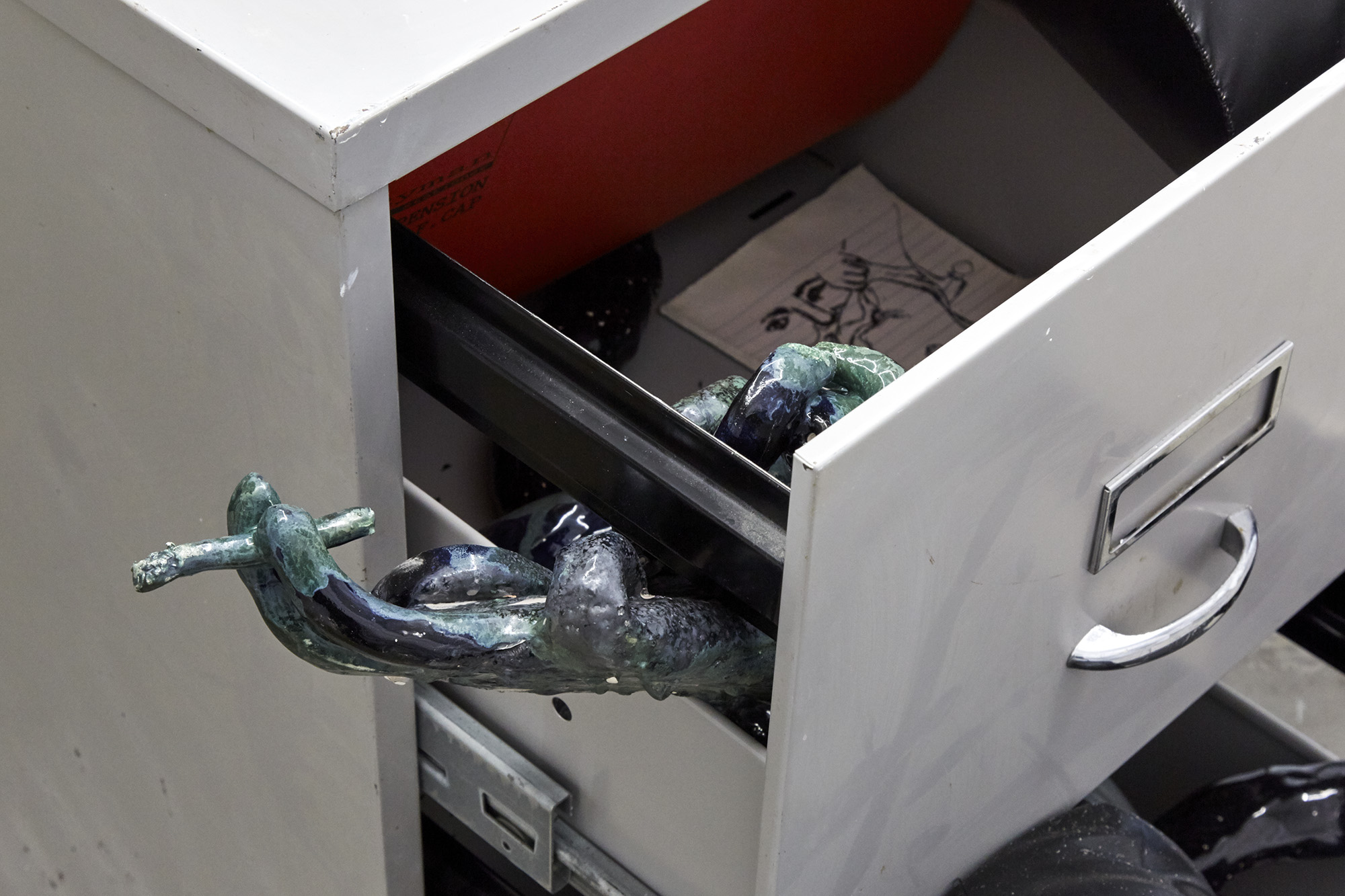 Untitled (detail) Leather, ceramic, filing cabinet Dimensions variable, 2019