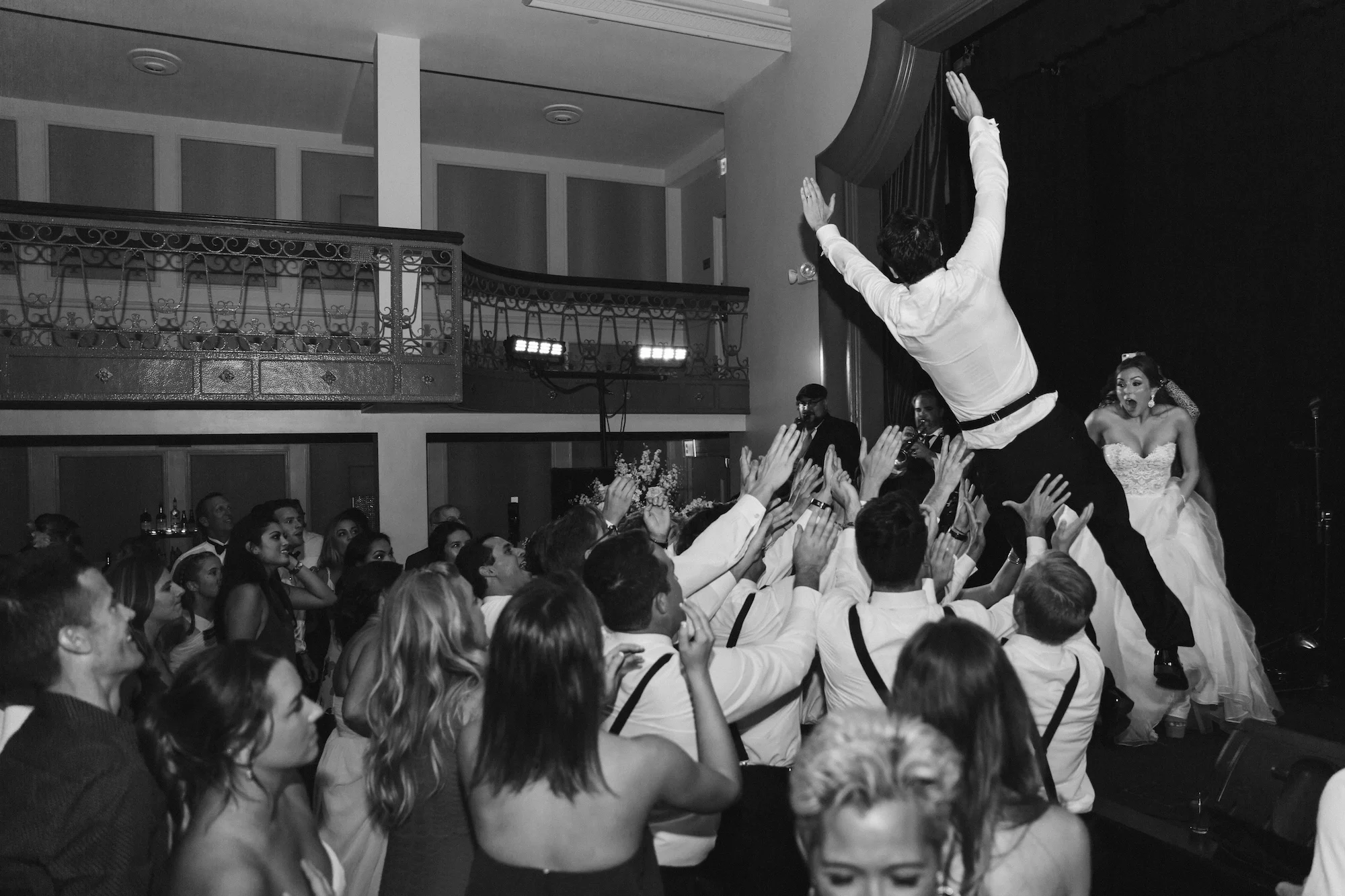 groom-crowd-surfing-wedding-reception-st-anthony.JPG