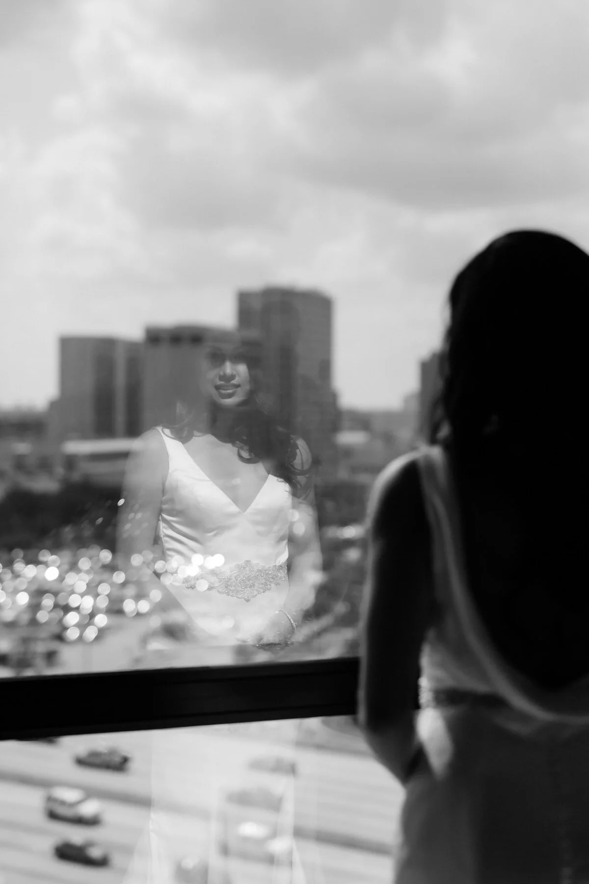 bride-window-reflection-houston-hotel-derek.jpg