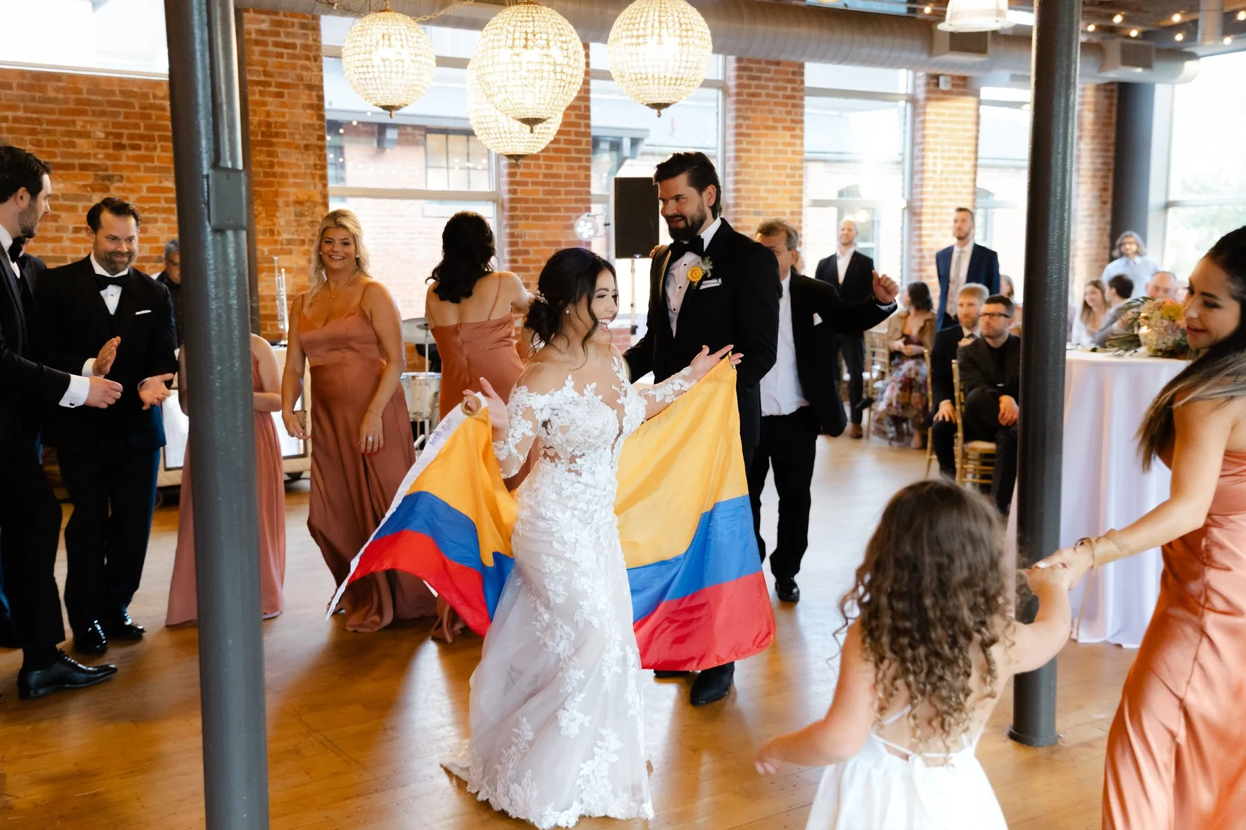 bride-dancing-columbia-flag-reception-huguenot-loft-greenville.jpg
