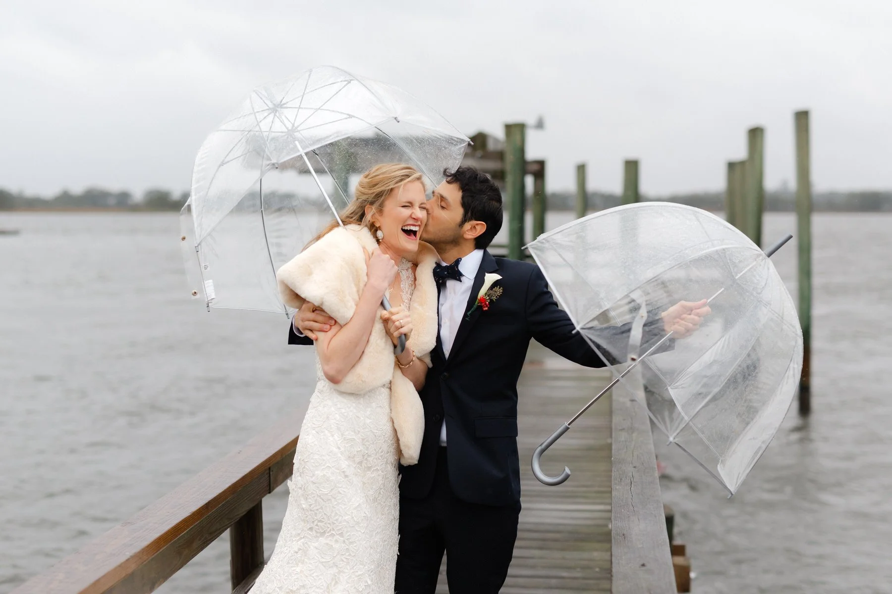 bride-groom-wedding-first-look-rain-umbrellas-island-house-charleston.jpg