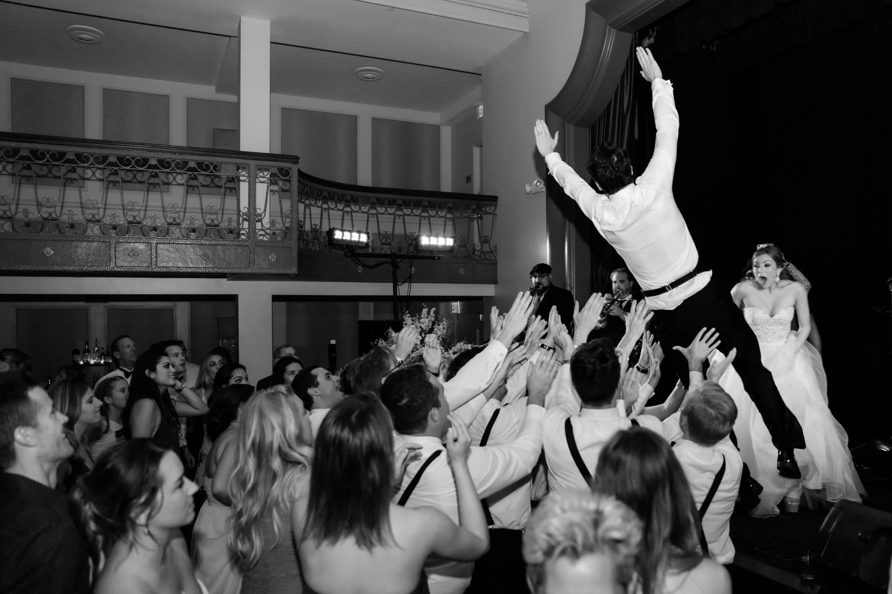 groom-crowd-surfing-wedding-reception-st-anthony.jpg