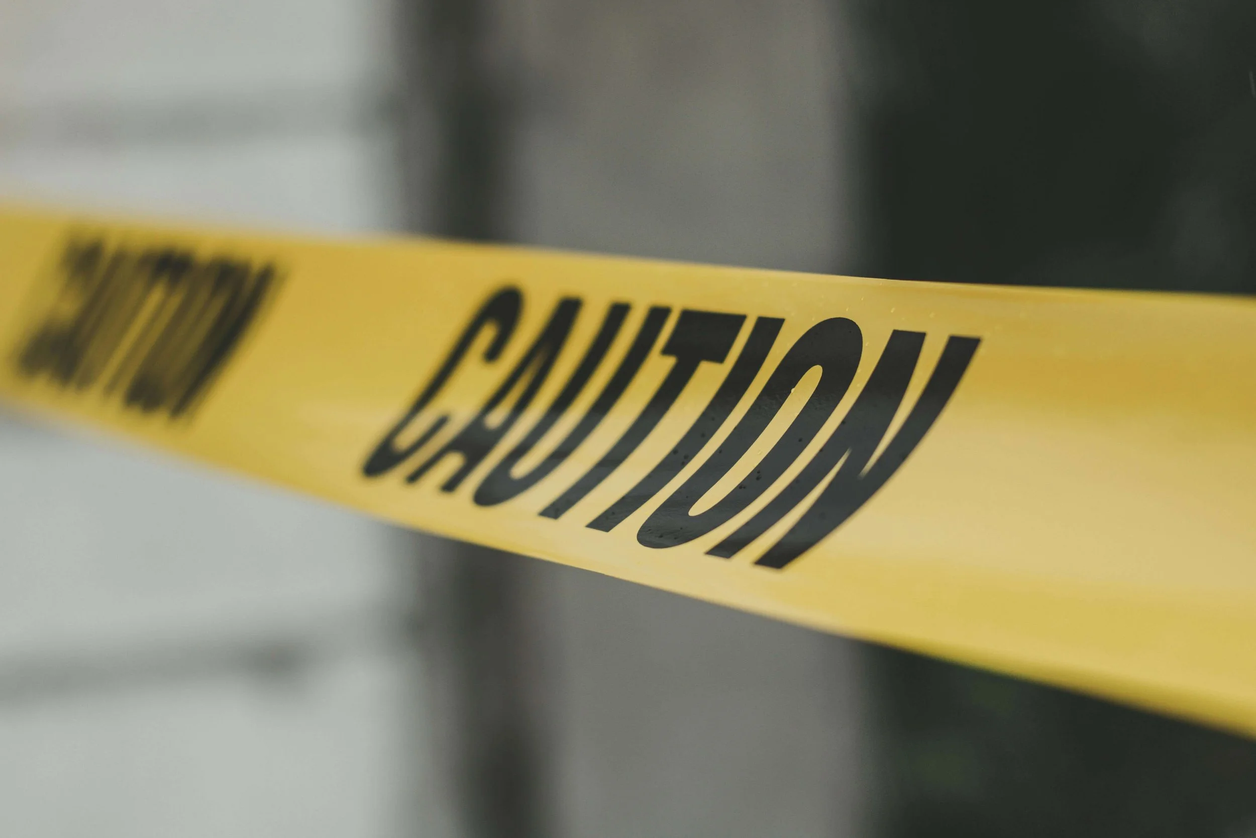 Caution tape representing workplace safety concerns requiring neuropsychological testing South Bay and employee psychological testing Los Angeles for fitness for duty evaluation