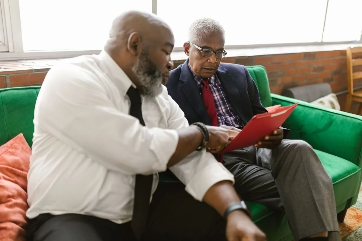 Legal professional reviewing capacity documents with senior client supported by geropsychologist in Los Angeles, CA and geropsychology in Los Angeles, CA for probate case