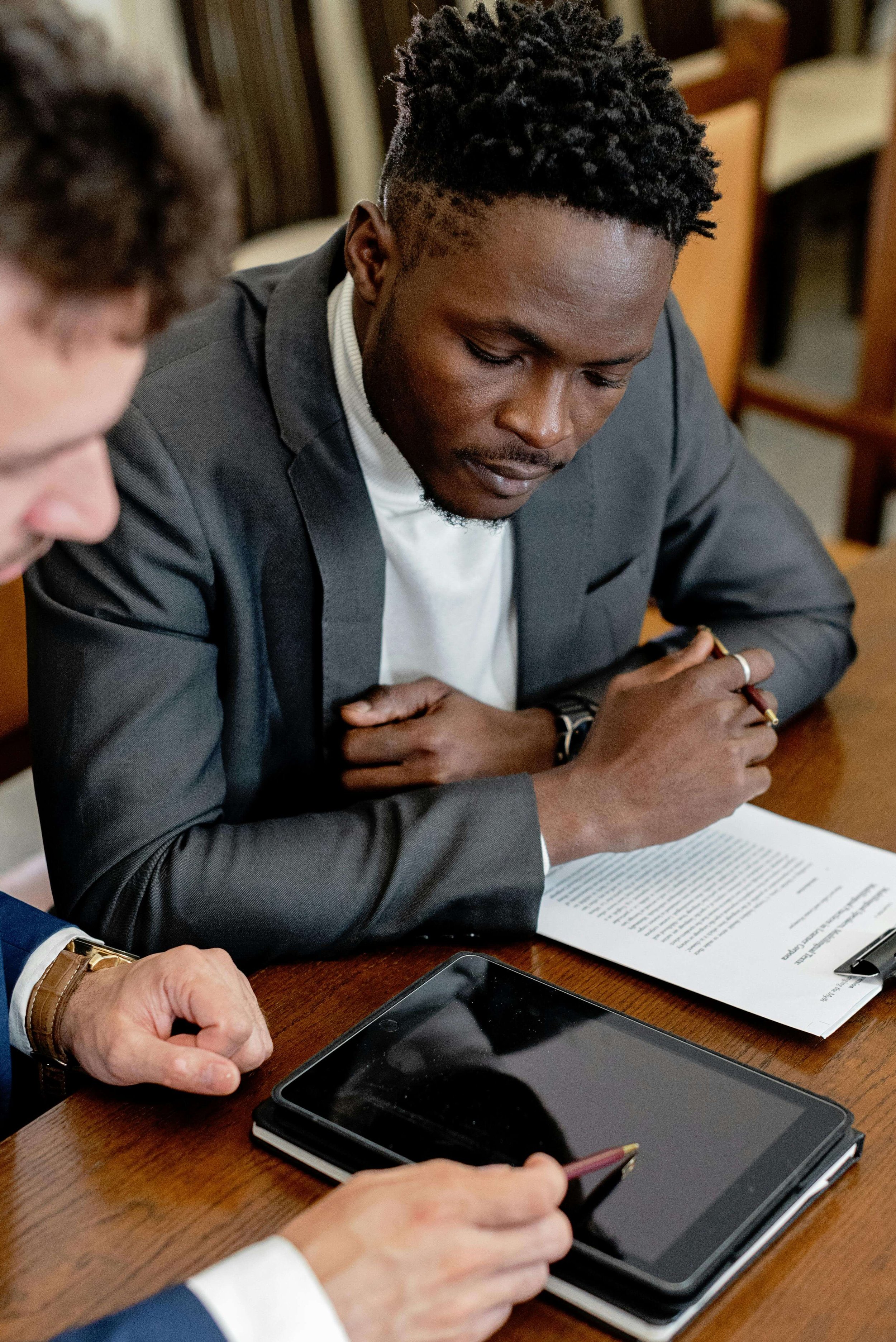 Employee reviewing documents with attorney about psychiatric fitness for duty evaluation Los Angeles and psychological testing for ADHD in adults in Los Angeles, CA workplace assessment