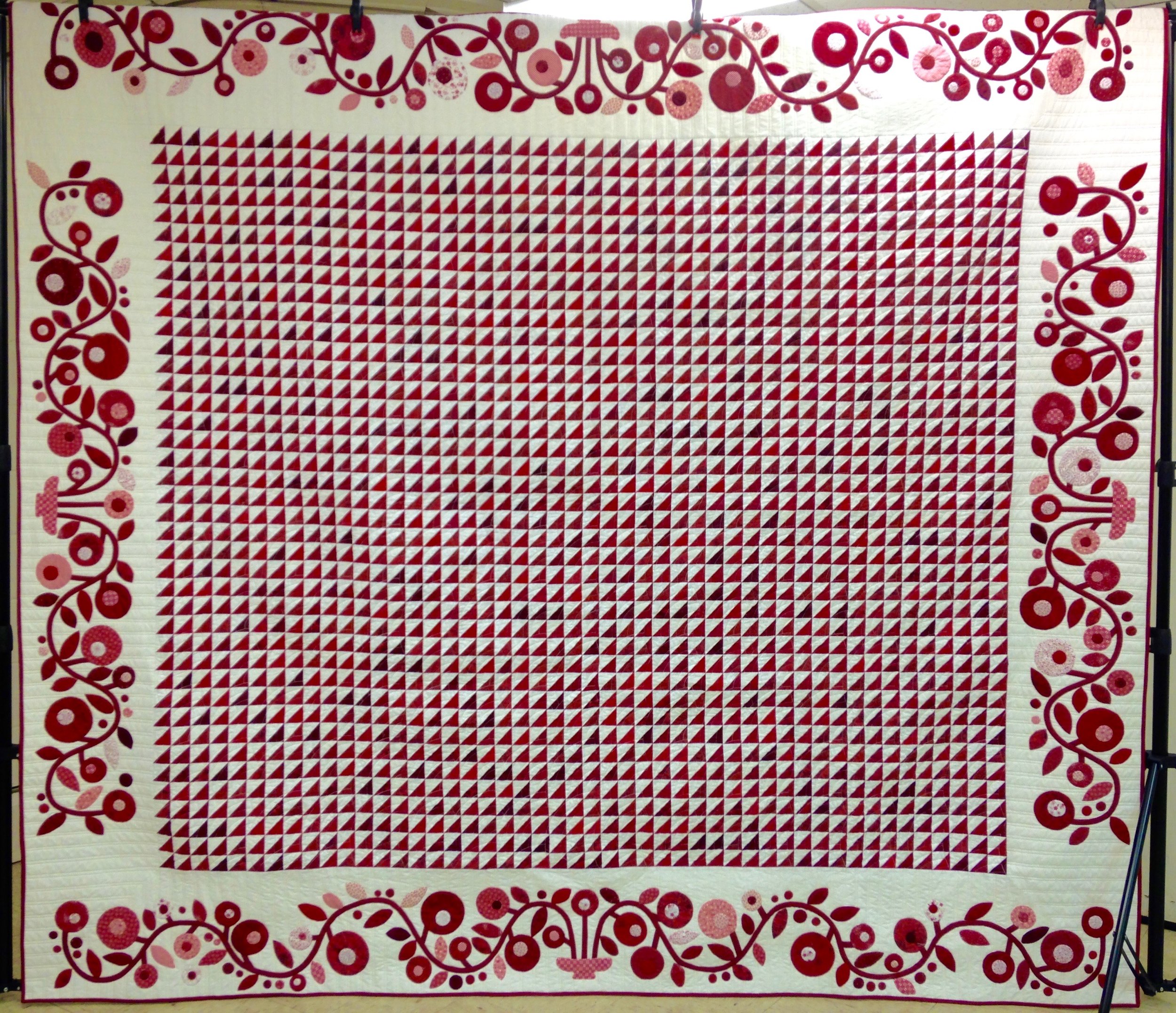 Patty’s Posies, Pieced, Appliquéd, Custom Machine Quilted, Donated by Maple Leaf Quilt Guild, 95 x 103”