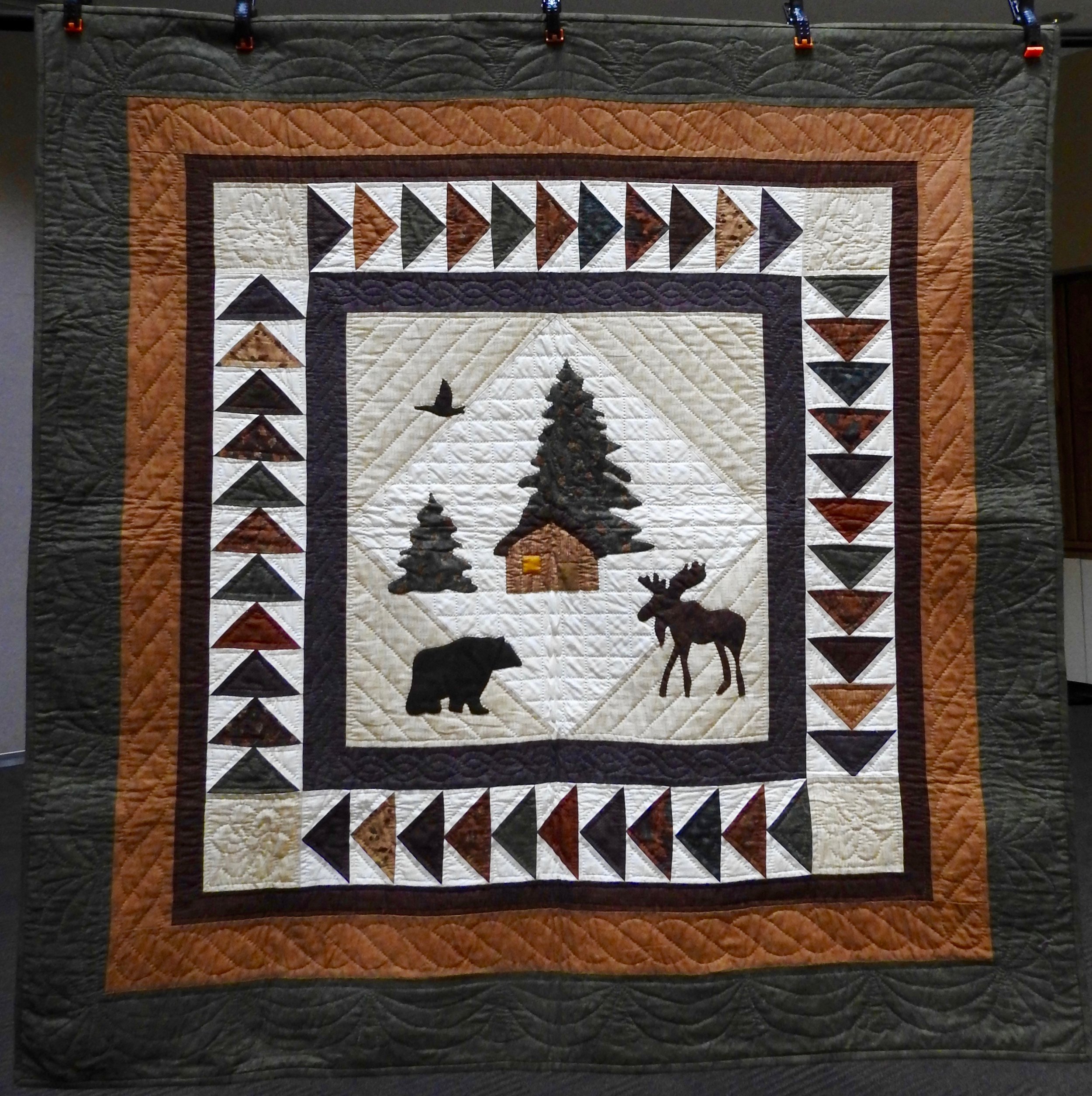 Rustic Cabin, Pieced, Appliquéd, Hand Quilted, donated by Ann Marie Gebbart, 54 x 54”