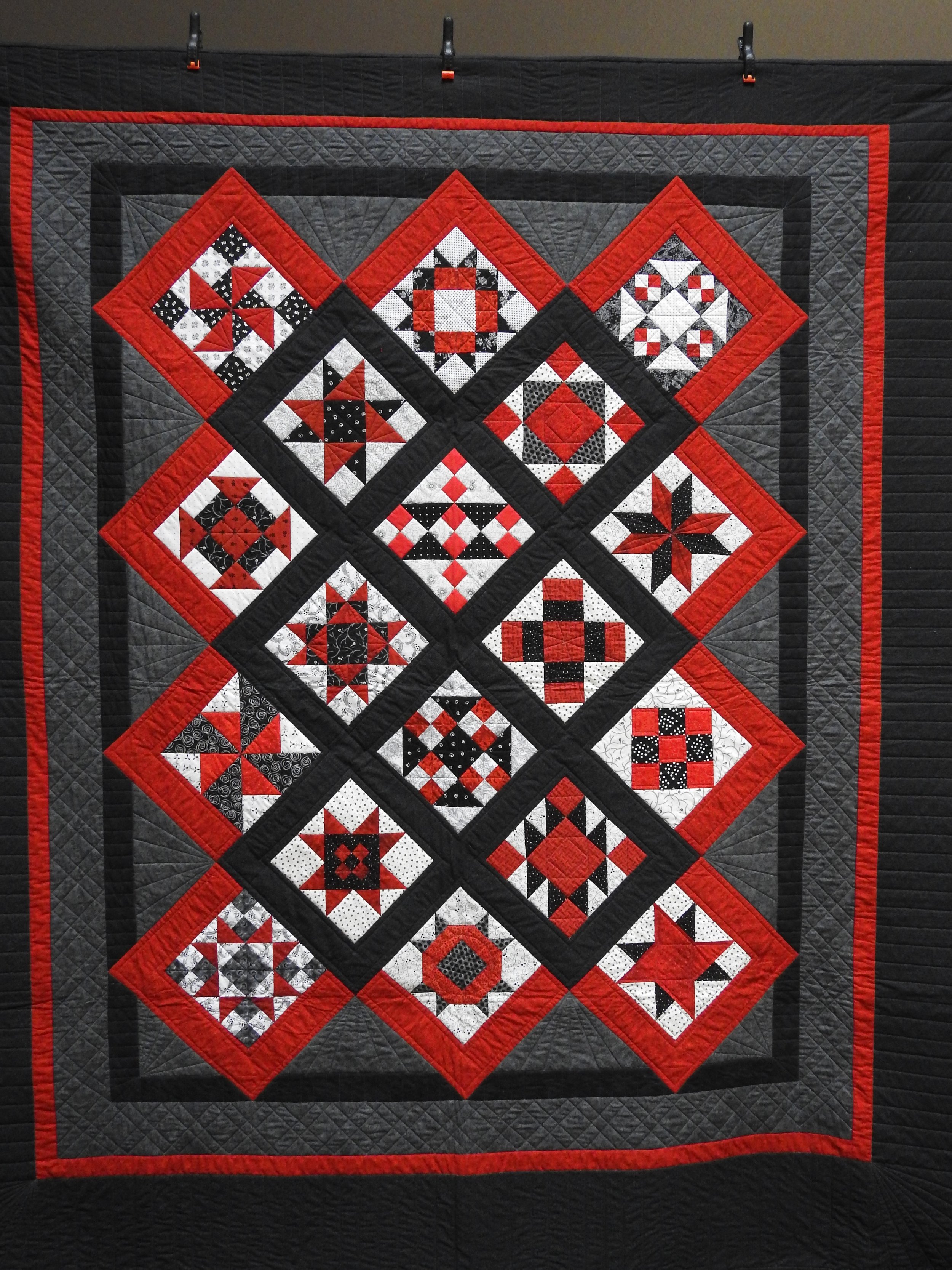 Sampler in Red & Black, Pieced, Custom Machine Quilted, Anonymously donated, 86 x 92”