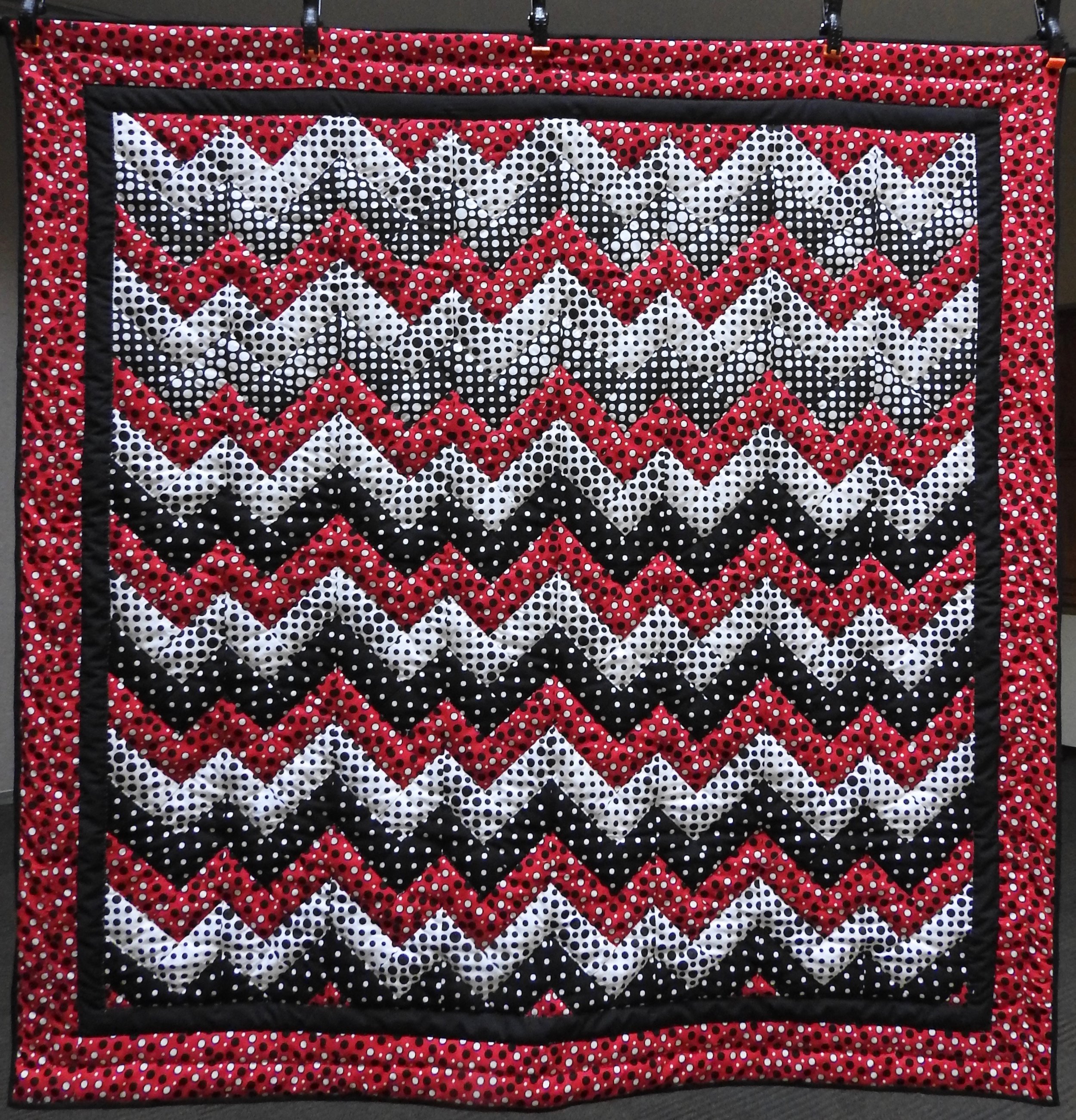  A Zig and a Zag, Pieced, Hand Quilted by Evergreen Place Quilters, donated Anonymously, 54 x 56”