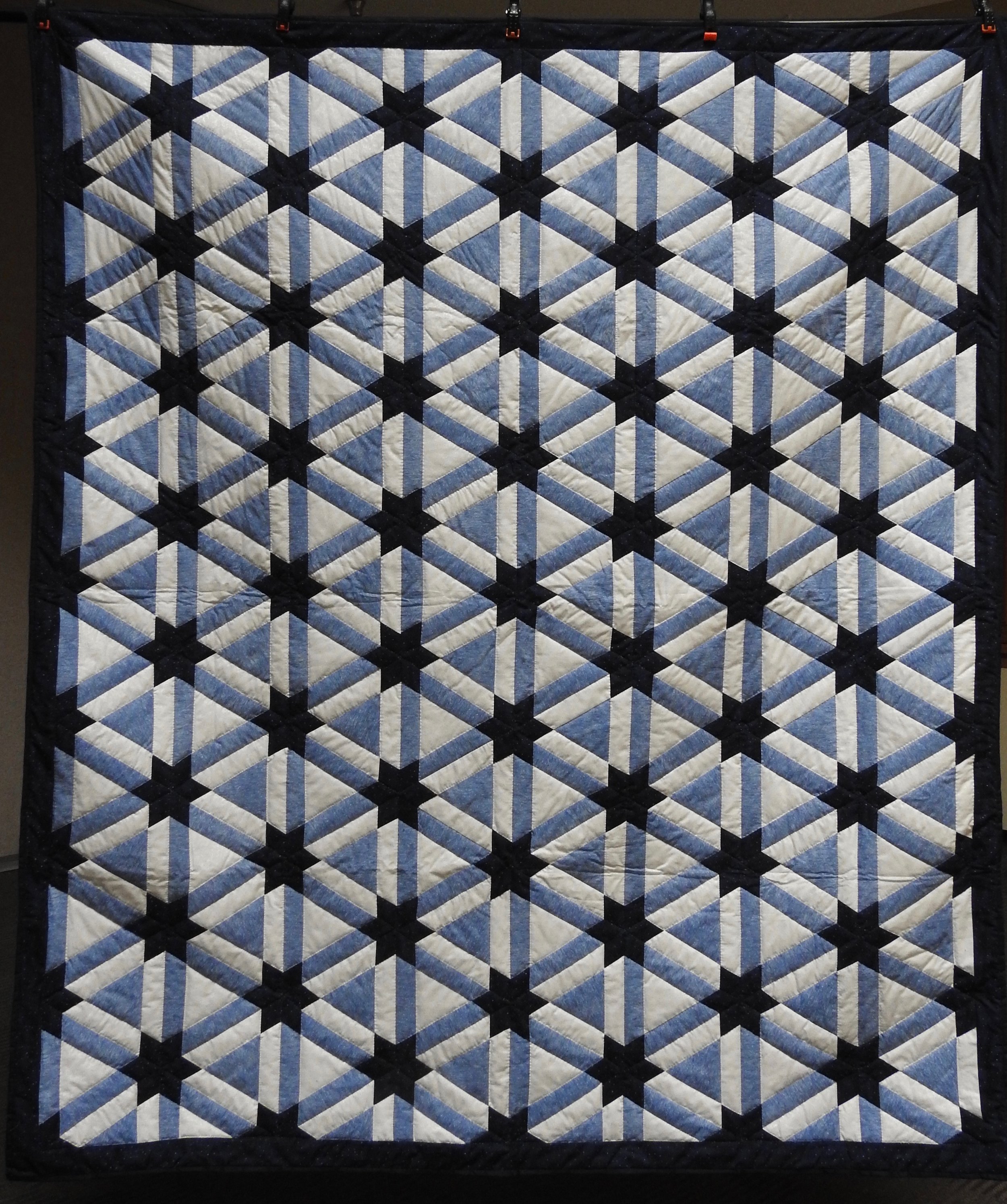 A Galaxy of Stars, Pieced & Hand Quilted, donated by The Depot Quilt Room, 67 x 80”