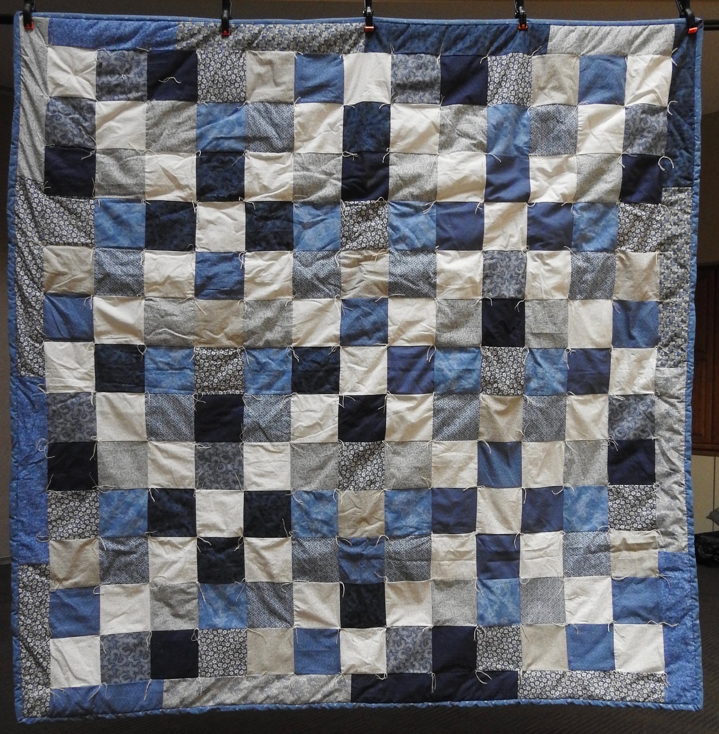 Blue Skies Comforter, Pieced &amp; Knotted, donated by The Depot Quilt Room, 74 x 77”