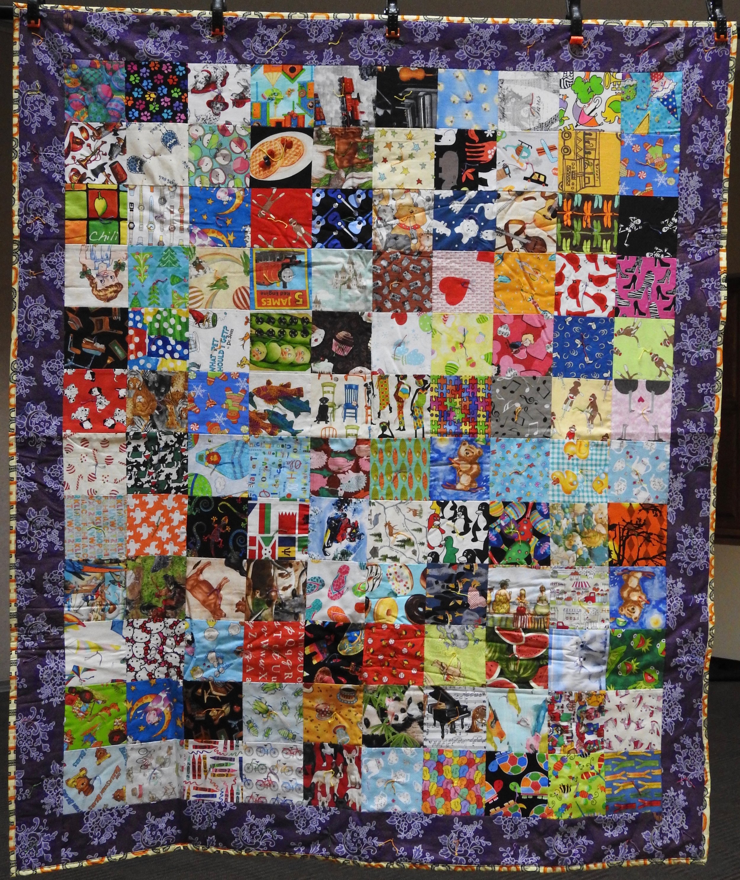 I Spy Comforter, Pieced &amp; Knotted, donated Anonymously, 51 x 62”