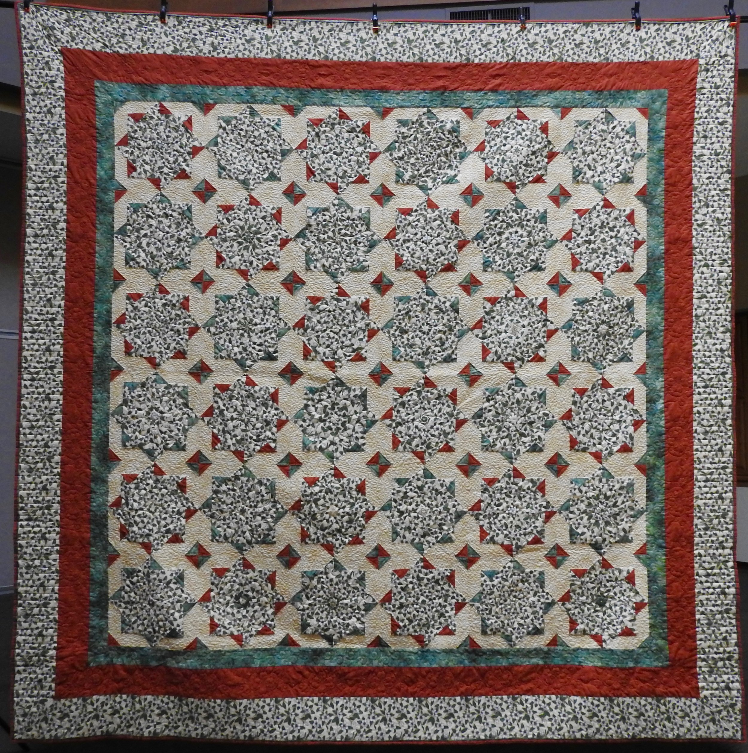 Whack ’n Stack, Pieced by Jean Mann Graber, Custom Machine Quilted, donated by the Cal Graber Family, 116 x 118”