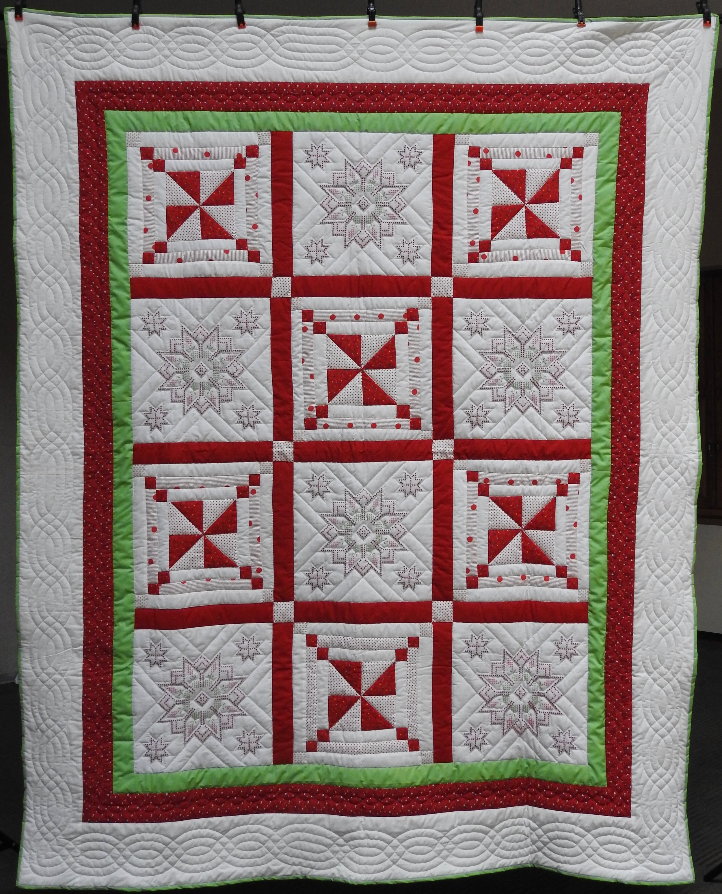 Stars & Pinwheels, Pieced, Hand Embroidered, Hand Quilted, donated Anonymously, 78 x 96”