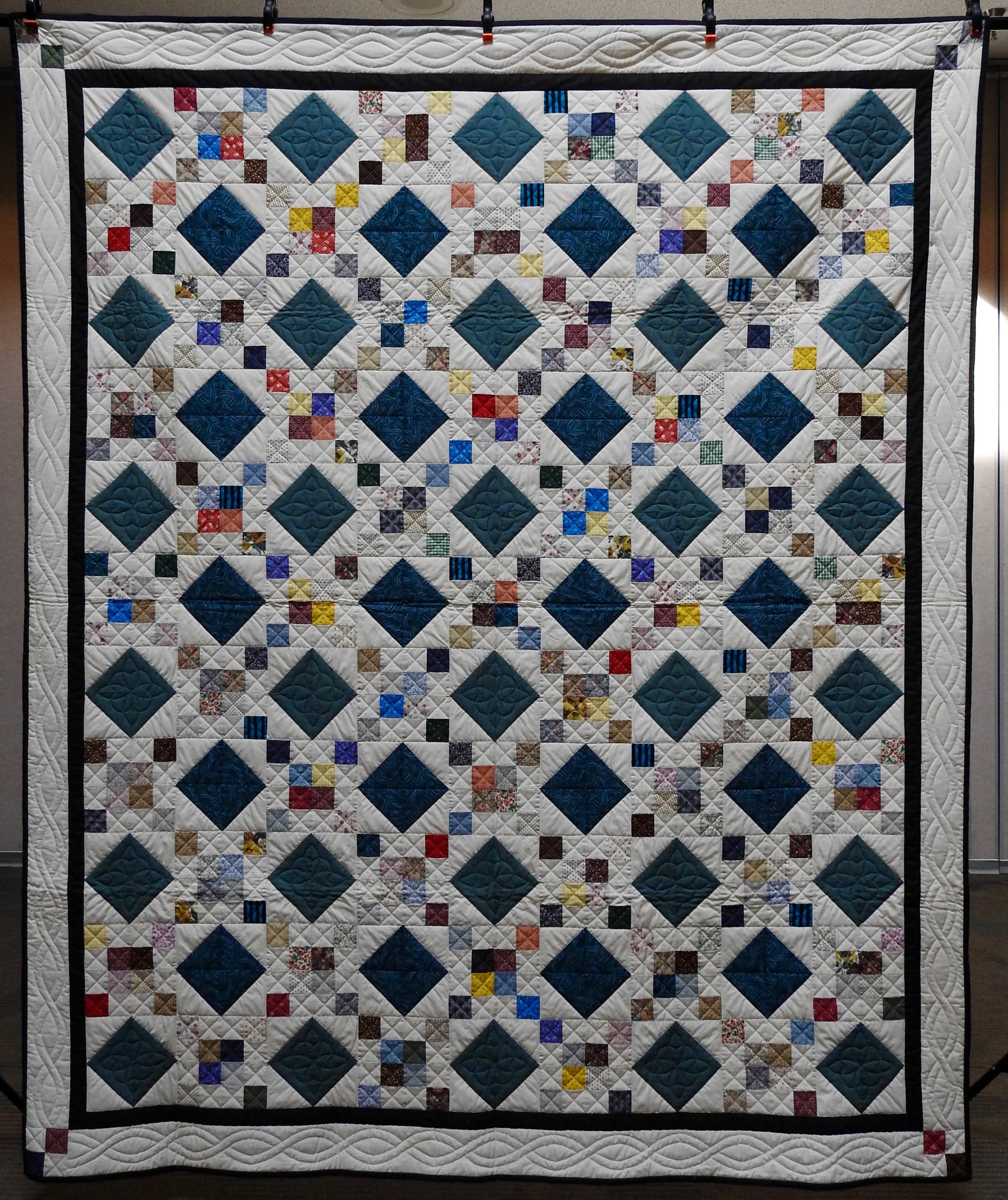 Jewel Box, Pieced &amp; Hand Quilted by Isabel Leipprandt, Signed &amp; Dated, donated by Wayne &amp; Karen Moss, 82 x 99”