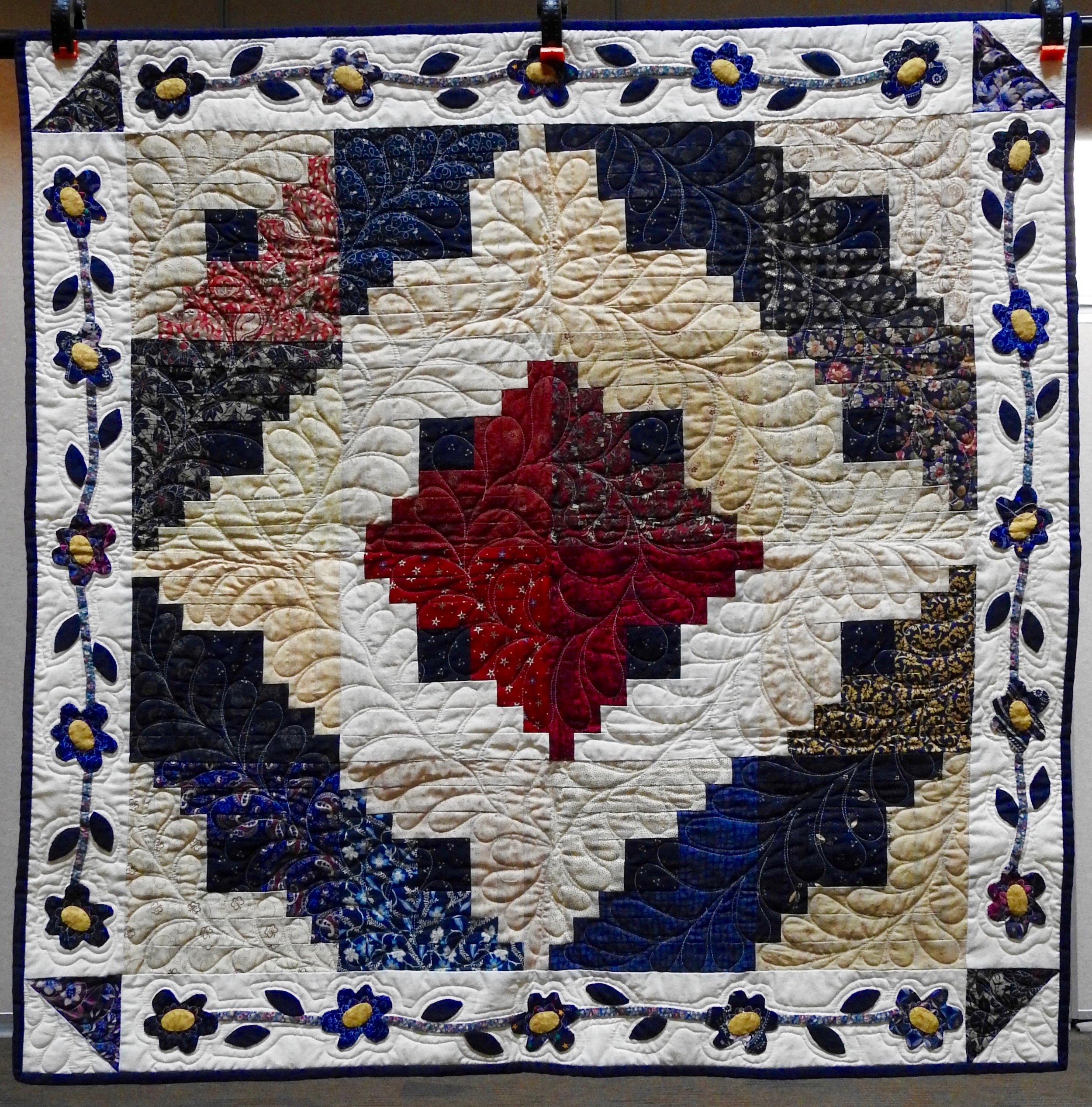 Flowers Surround the Cabin, Friendship blocks pieced and signed &amp; Appliquéd Custom machine quilted, donated by Wayne &amp; Karen Moss, 39 x 39”