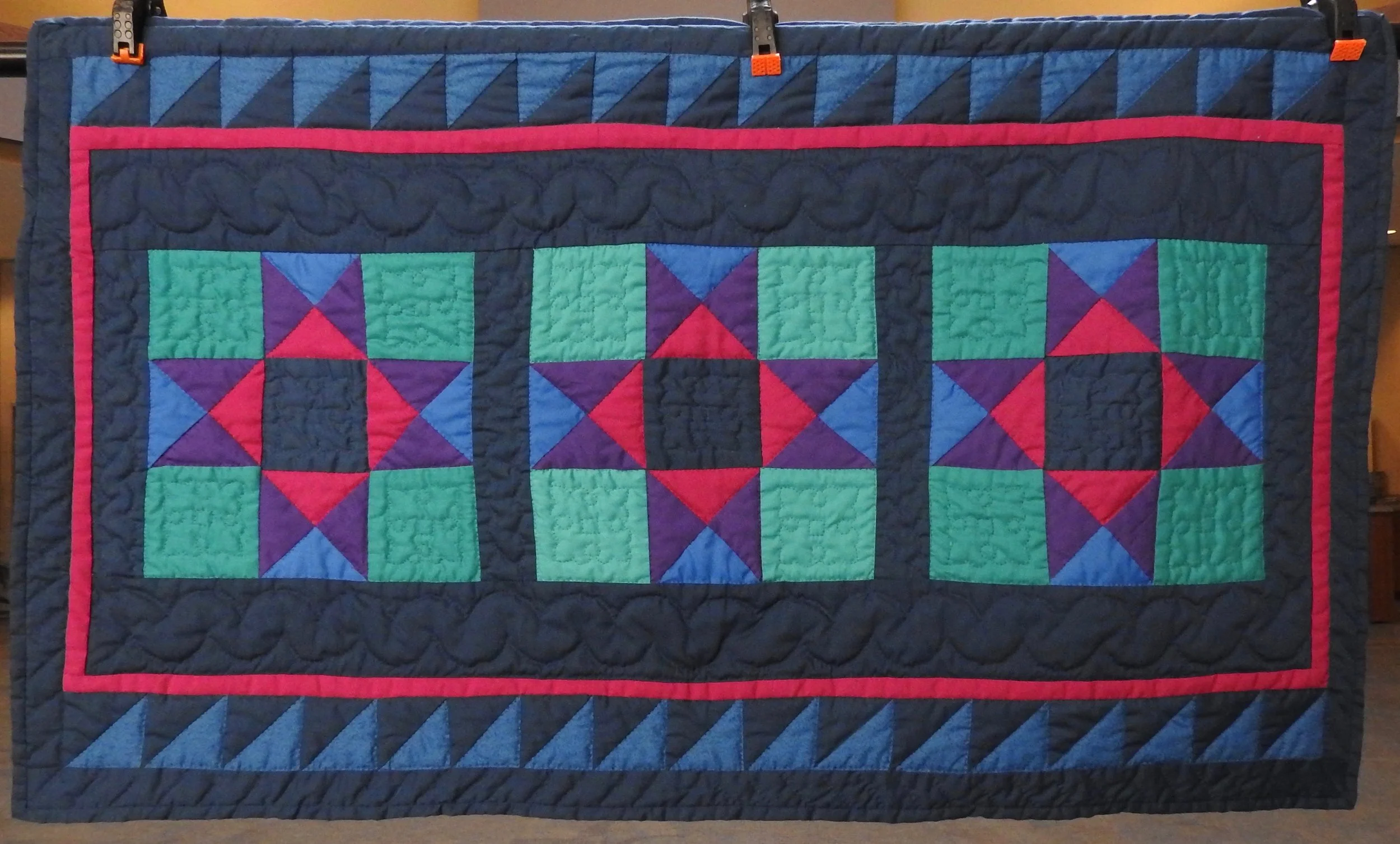 Three Stars in my Sky, Pieced & Hand Quilted by Helen Leichty, donated by Genny Schwartzentruber, 41 x 24”