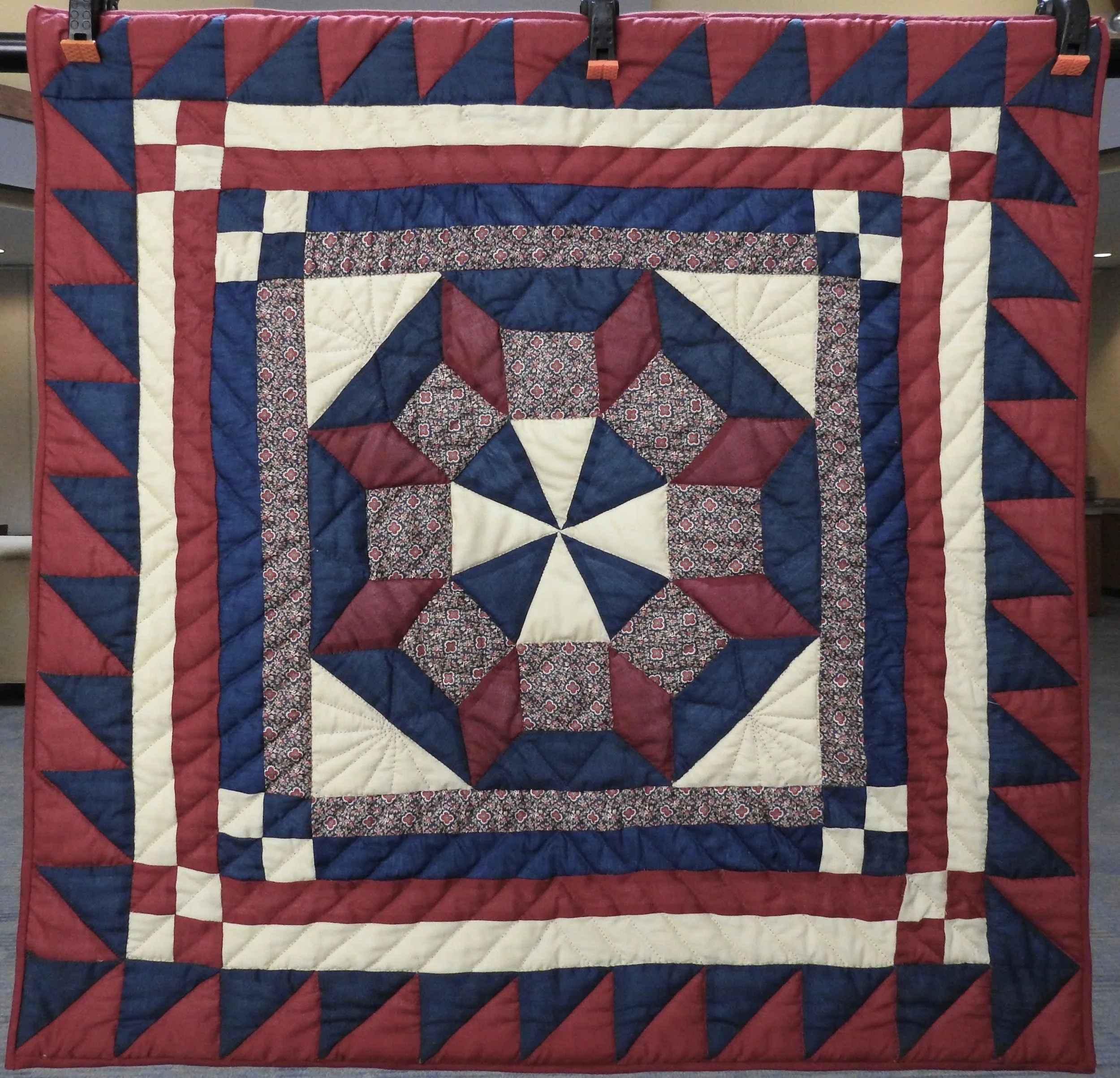 My Castle’s Wall, Pieced & Hand Quilted by Helen Leichty, donated by Genny Schwartzentruber, 31 x 31”
