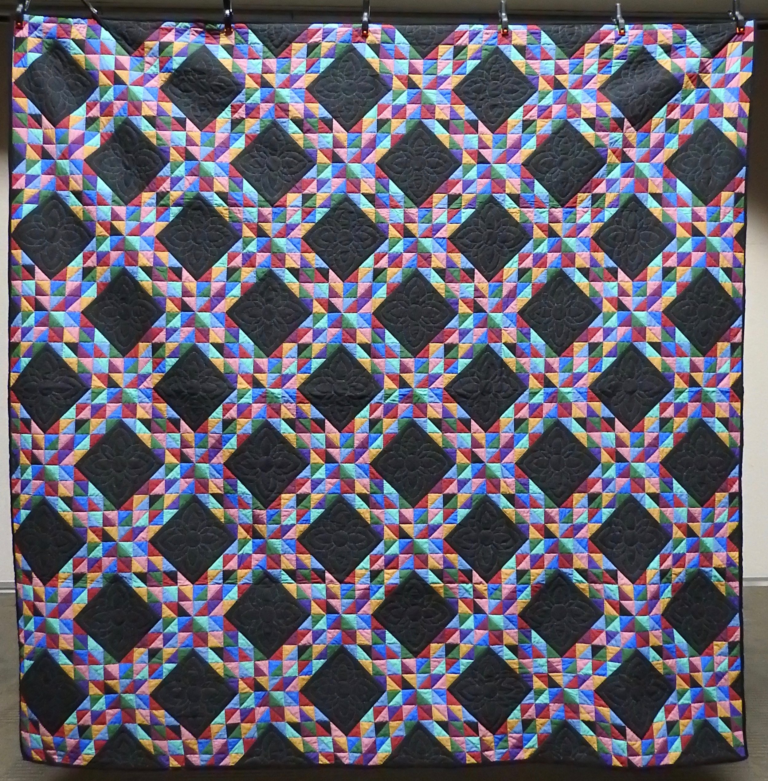  Amish Triangles, Pre-printed fabric, Single Needle Hand Quilted, Clinton Frame Church, 87 x 87”