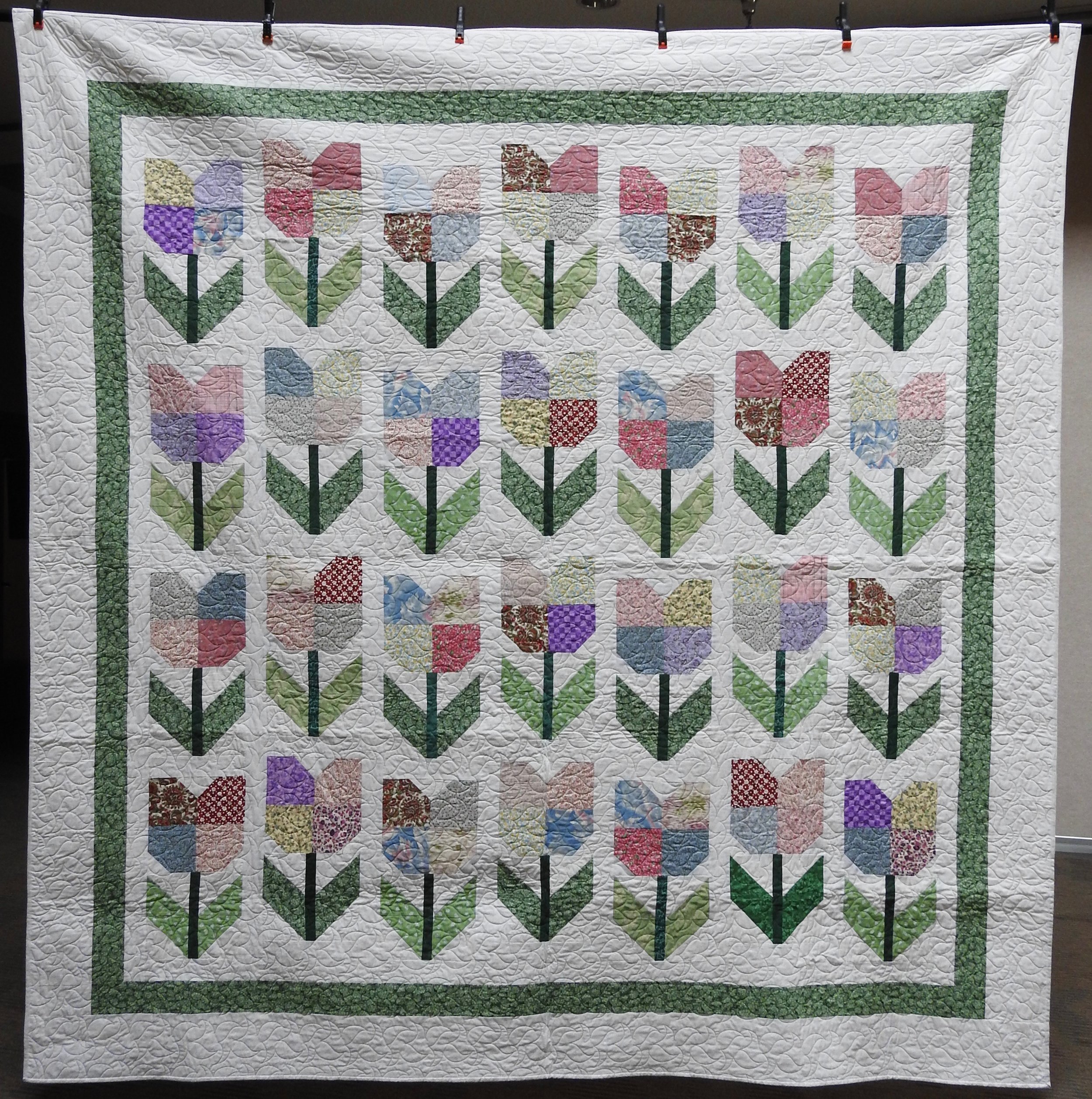 Totally Tulips, Pieced by Ruby Bontreger, Edge to Edge Machine Quilted, Signed &amp; Dated, donated by First Mennonite, Middlebury, 96 x 96”