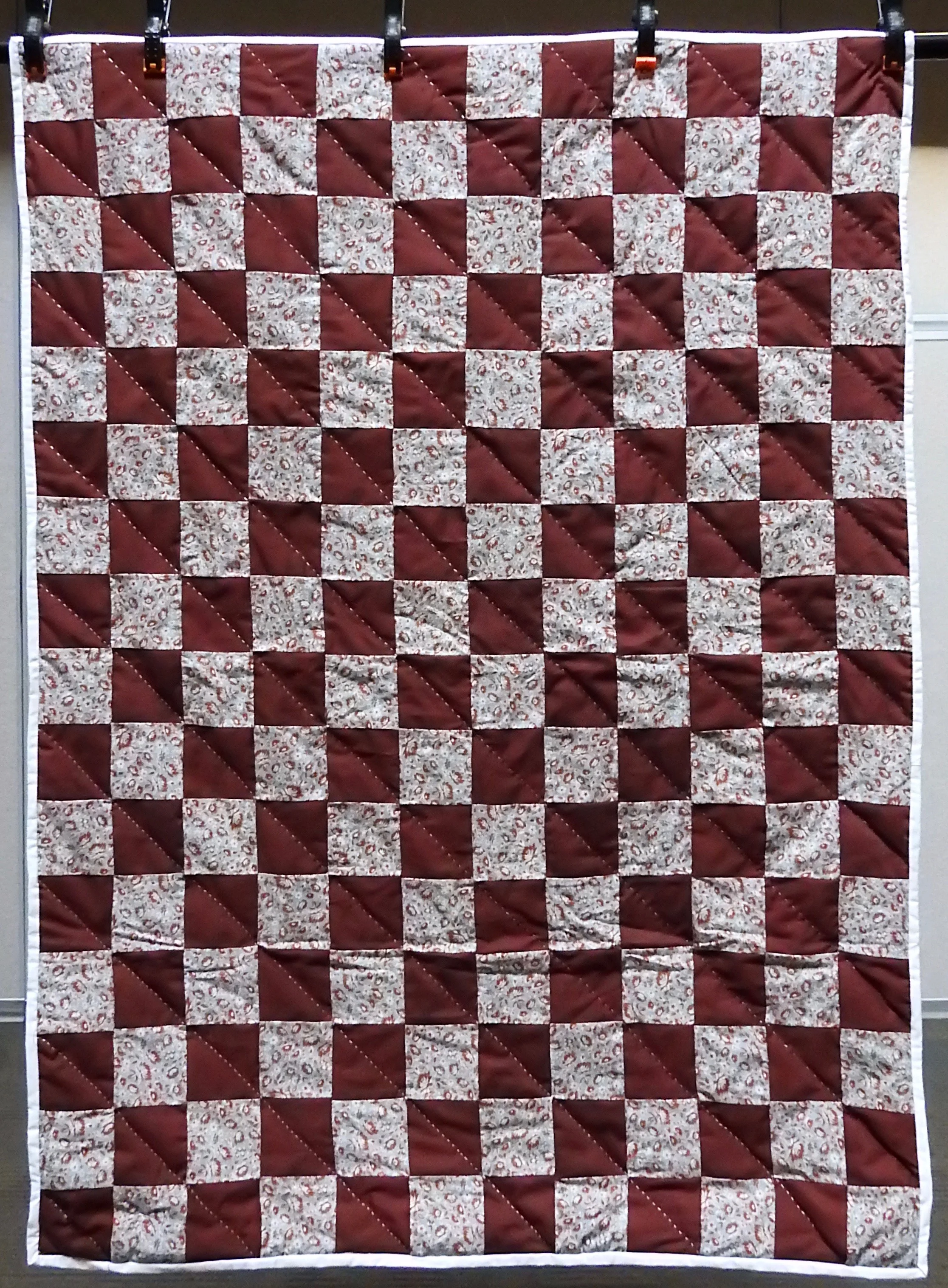 Burgundy Blocks Baby Quilt, Pieced, Long Stitch Hand Quilted, donated by First Mennonite, Middlebury, 40 x 54”