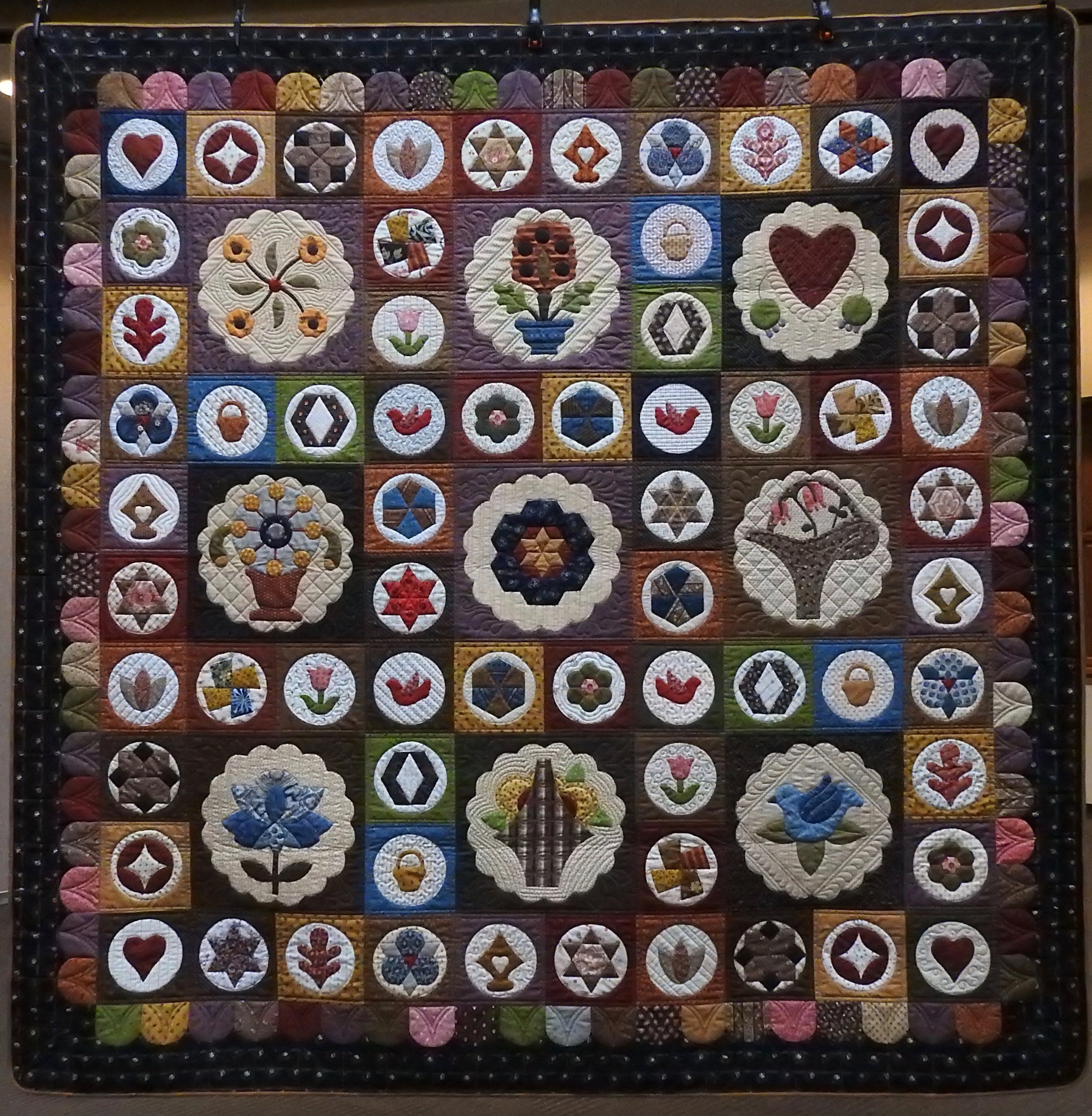 Antique Sampler Quilt, Pieced &amp; Appliquéd of New Fabrics by Edith Shanholt, pattern adapted from Antique Quilt by Sue Daley, Custom Machine Quilted, donated by Edith Shanholt, 72 x 72”