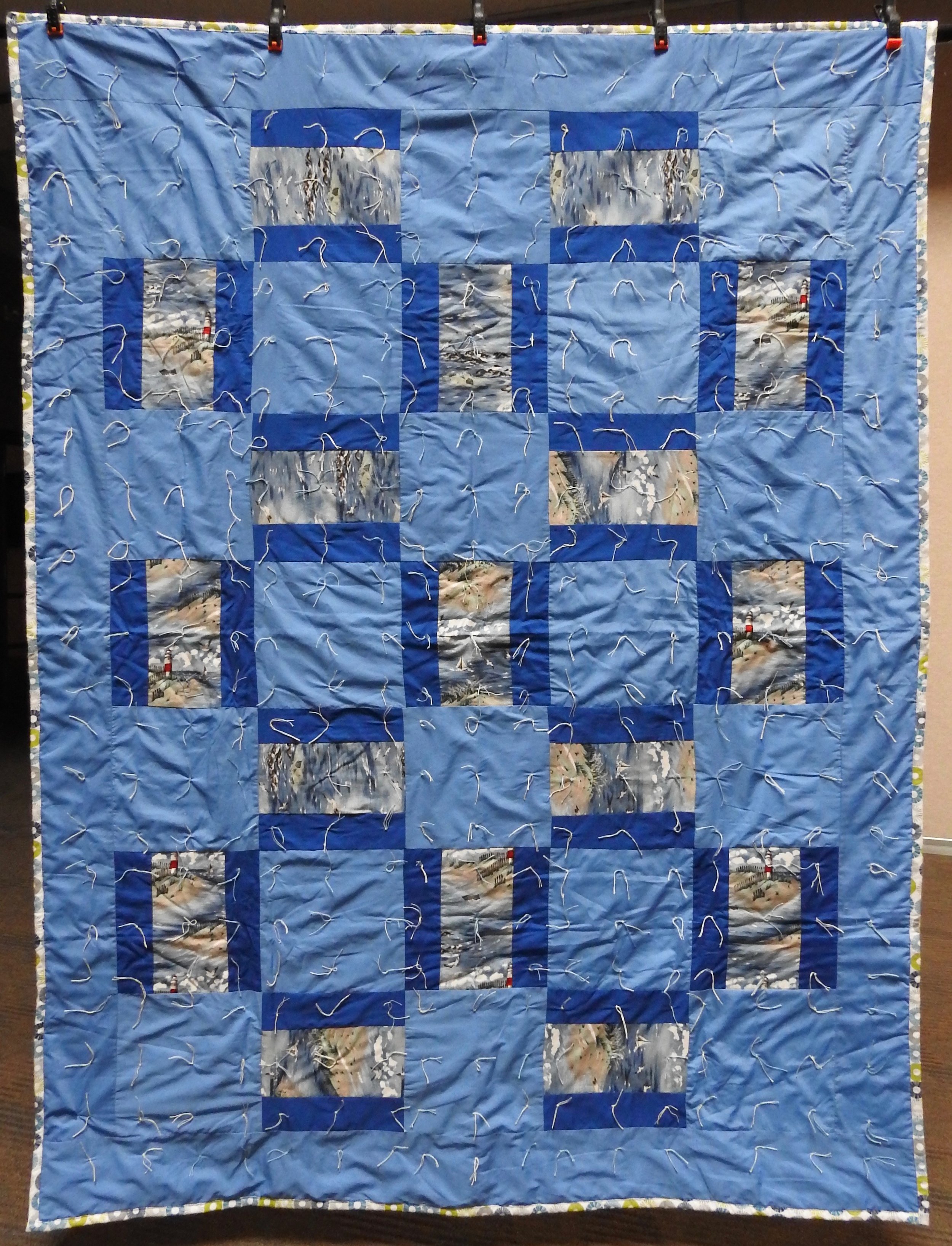 By the Sea Comforter, Pieced &amp; Knotted, donated by Howard-Miami Mennonite Church, 60 x 80”