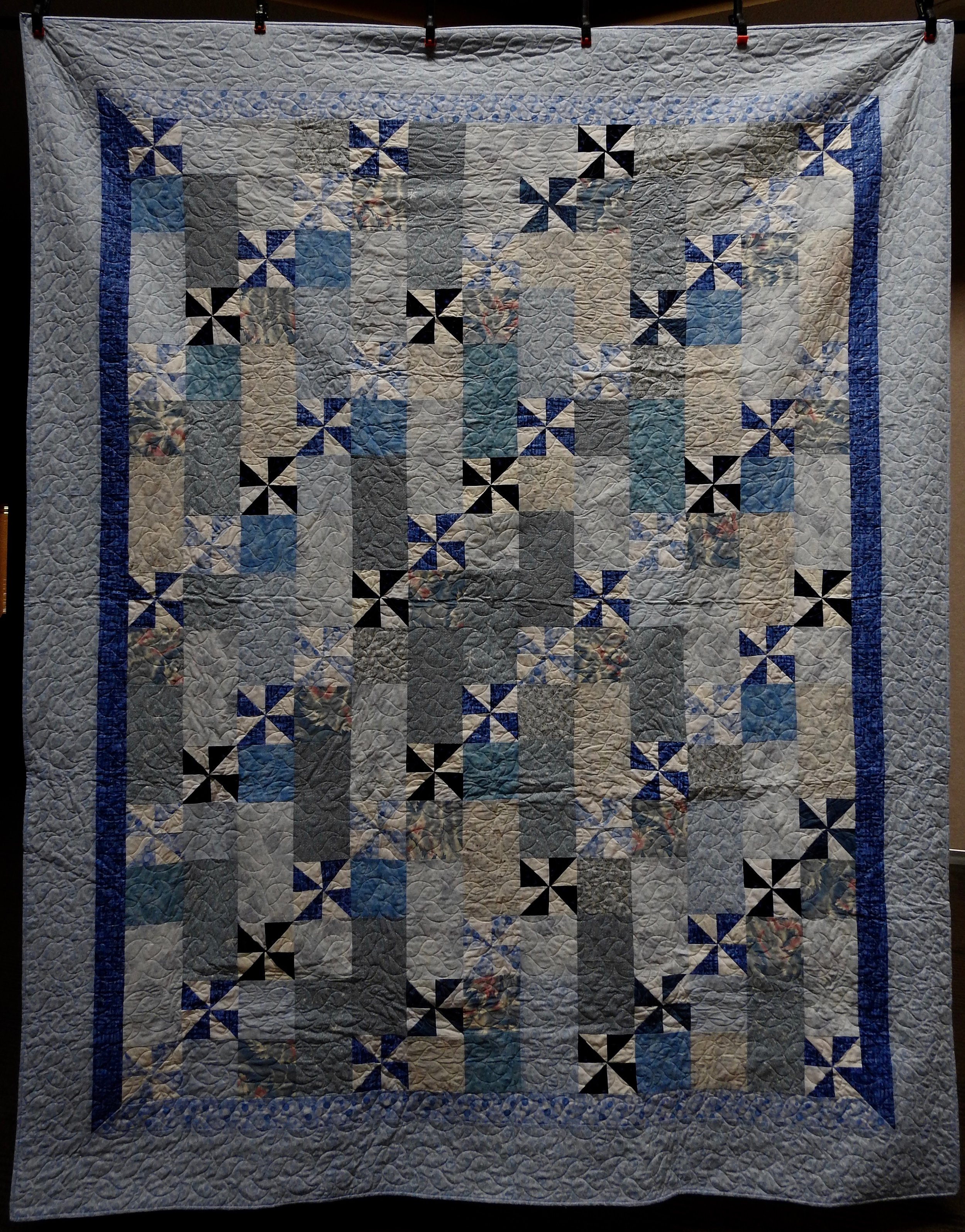 Pinwheels Galore, Pieced by Ruby Bontreger, Edge to Edge Machine Quilted, signed &amp; Dated, donated by First Mennonite, Middlebury, 78 x 99”