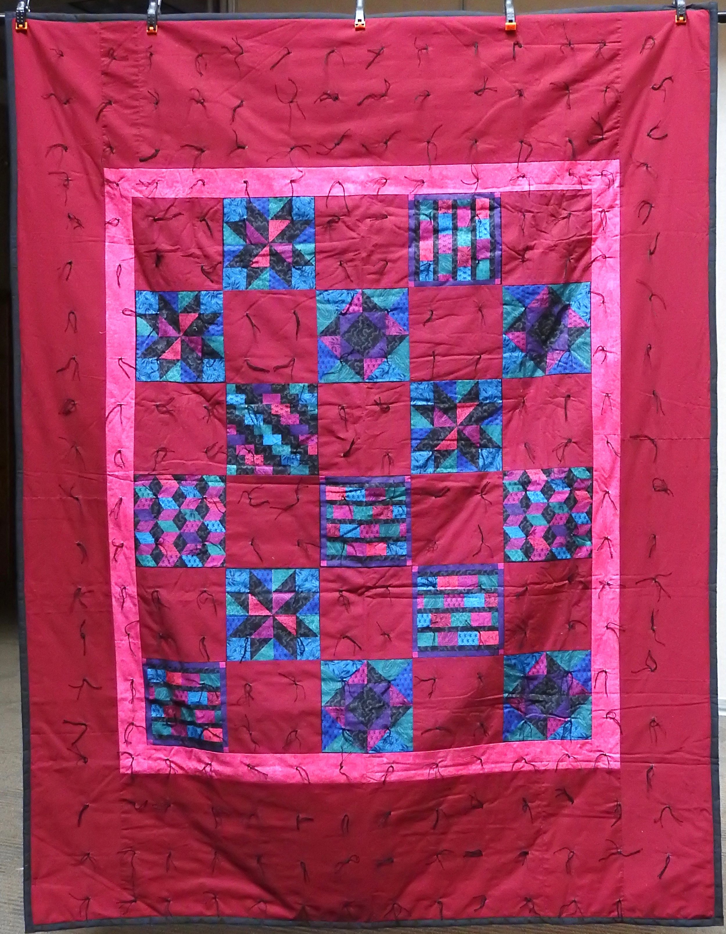 Color Me Bright Comforter, Pieced, Knotted, donated by Howard Miami Mennonite Church, 60 x 80”