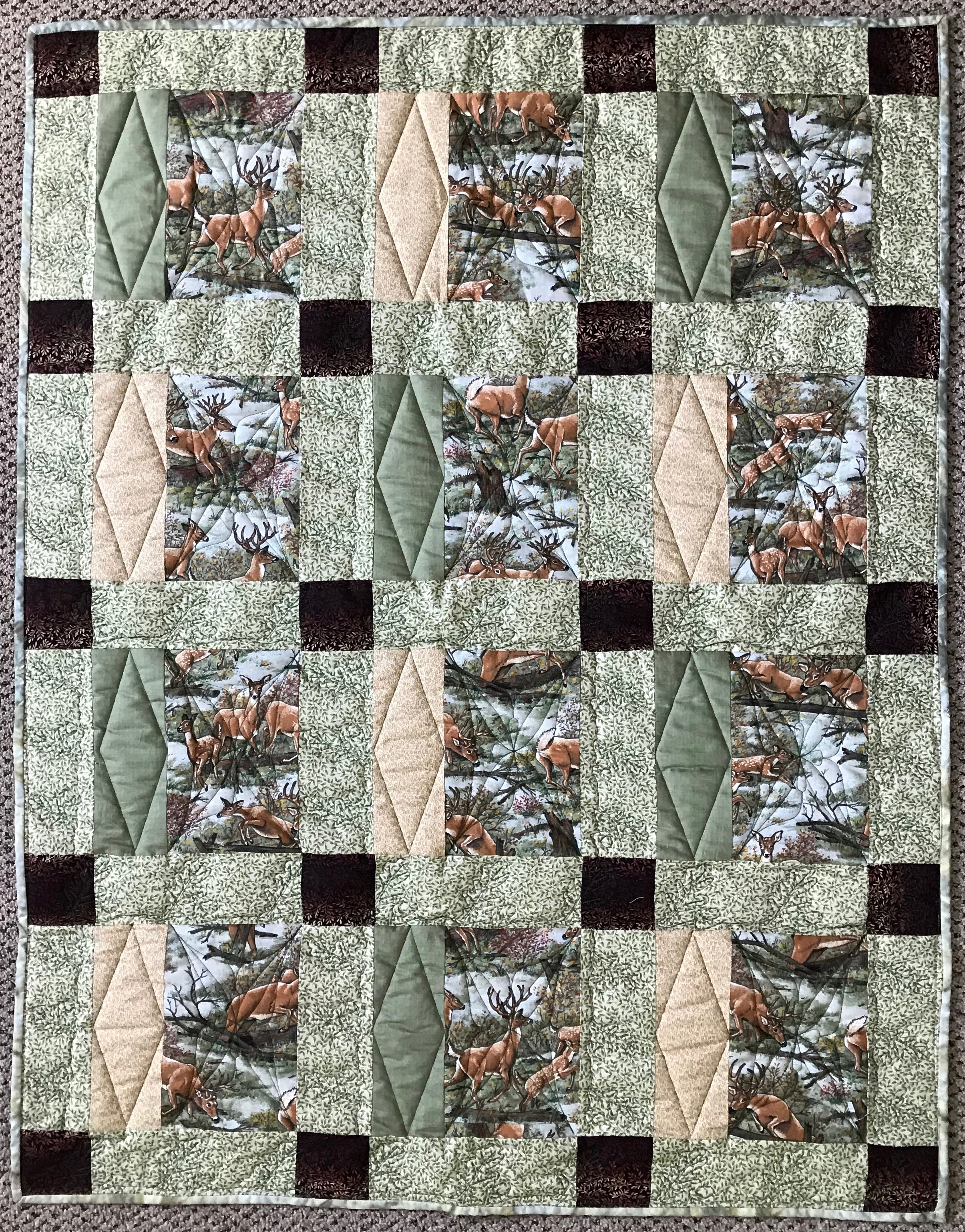 Deer in the Glen, Pieced, Machine Quilted, donated by Phyllis Schrag, 37 x 47